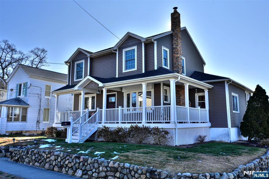 Lovingly cared for and thoughtfully expanded, this charming four-bedroom, two and a half bath Colonial welcomes you from the moment you step onto its inviting front porch. Inside, the first floor offers a classic yet comfortable layout featuring a central staircase, a sun-filled living room with fireplace, cozy den, formal dining room, and the convenience of a first floor bedroom with a full bath, plus an additional half bath. The eat-in kitchen features an island and opens seamlessly to the outdoor space, making it ideal for everyday living and entertaining alike. Upstairs youâ€™ll find a spacious primary bedroom complete with a walk-in closet, two generously sized additional bedrooms, and a second full bath with double sinks. The partially finished basement adds even more versatility, offering a family room, office or exercise space, a utility room with abundant storage, and direct access to the attached one-car garage. Step outside to a large deck with pergola overlooking a flat, fully fenced backyard with a firepit sitting area and shed - perfect for relaxing, playing, or hosting gatherings. Ideally located close to the train, bus, town center, and a highly regarded Blue Ribbon elementary school, this wonderful home is set in the sought-after town of Waldwick. A warm, welcoming place to put down roots and create lasting memories.