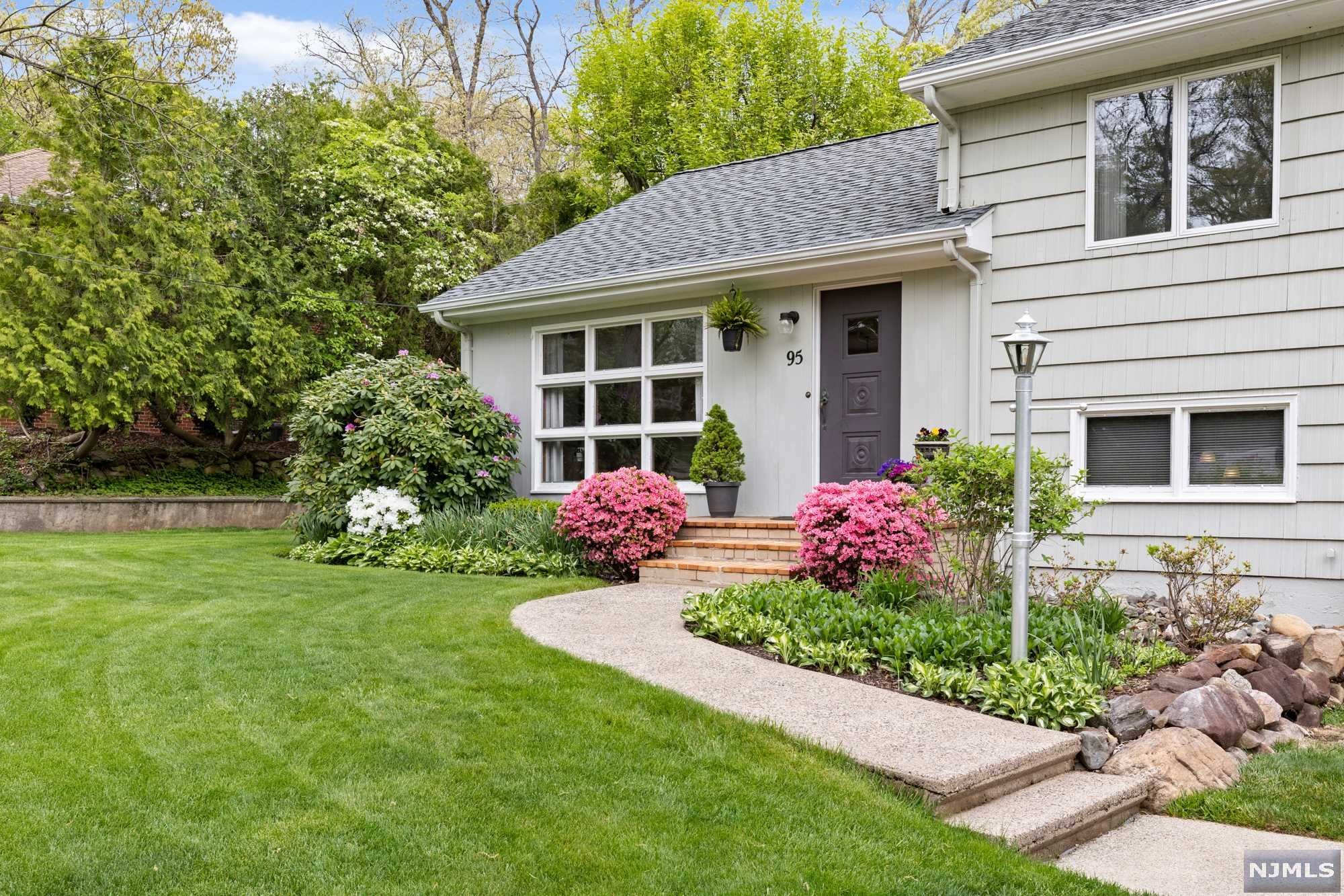 This Expanded Split Level is Located on one of the 'Prettiest Streets in Wayne' - 4/5 bedrooms/Office, 3 1/2 bath has many possible options available. Arboretum like property featuring an In-Ground Pool and multiple Patios - work from home, vacation & entertain at home. Impressive Master Suite with a Large Bedroom, Vaulted Ceiling, Skylights, Bath with Jetted Tub, Stall Shower, Custom Vanity, Large Walk-In Closet with Custom Shelving - Complete Your Private Escape. An abundance of natural light shines throughout the home. There is a full office or M/D with a full bathroom, overlooking park lake property - enjoy the mature plantings which bloom all season. The home has a new induction cooktop, Convection Oven and a Drawer Microwave Oven. Blue Ribbon Fallon School, Anthony Wayne & Wayne Valley. 1 mi to Whole Foods, Close to Trader Joes, Transportation, NJ Transit Center, Schools, Shopping, Parks & Worship. 20 mi to Lincoln Tunnel. Property is Sure to Please.