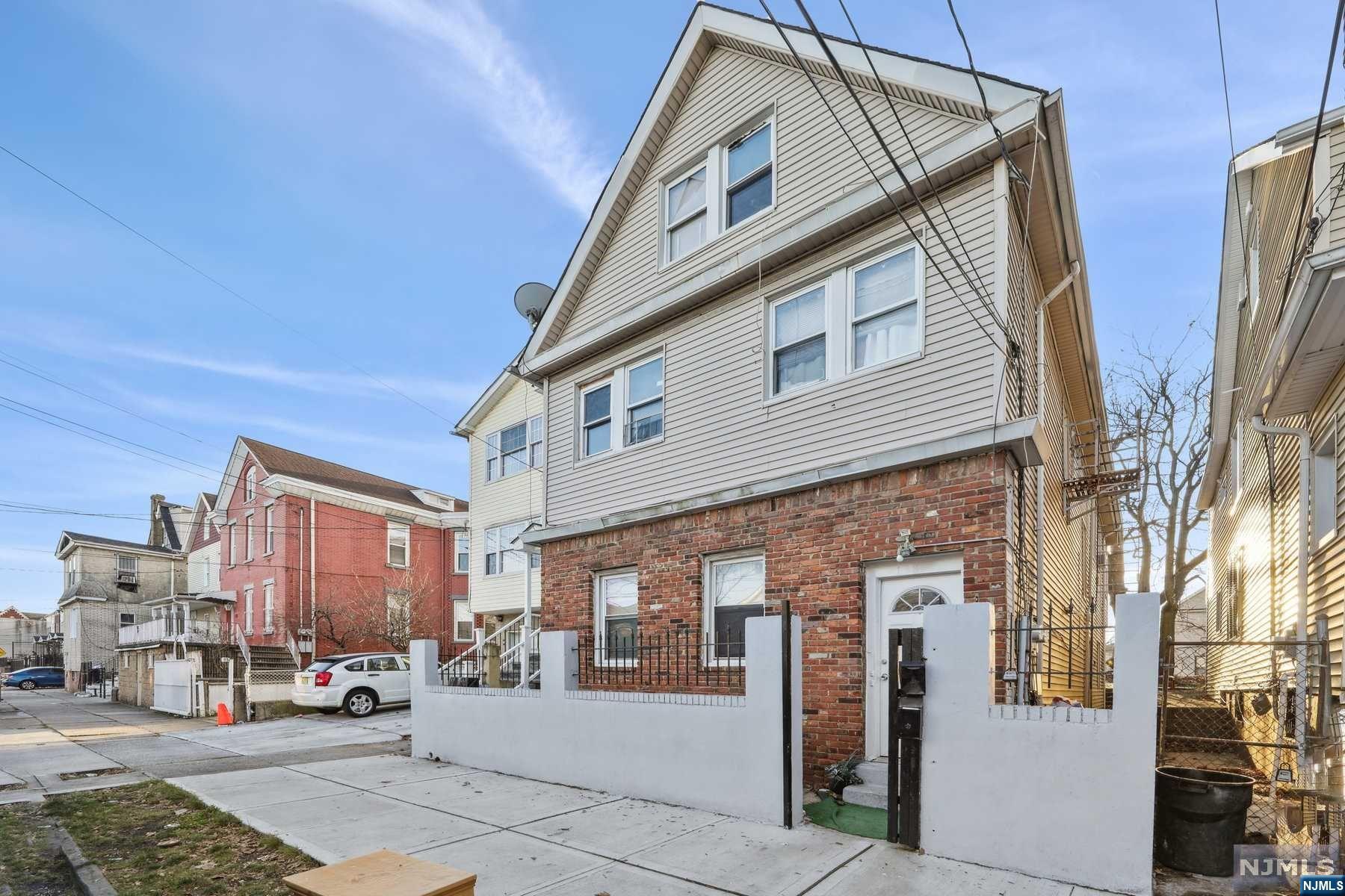 Discover the ideal investment in Elizabeth, NJ - a meticulously maintained two-family property with separate utilities, offering unparalleled convenience. This property comprises two units with a bonus attic! 1st floor has 3 beds and 1 bath, Second floor has 5 beds and 2 baths, and bonus attic has 2 beds and 1 bath. Totaling 10 beds and 4 baths. Additionally, it features an unfinished full basement with customization potential, strategically located near amenities and transportation. With a strong demand in the rental market, this property provides an enticing combination of immediate income and future growth potential. Don't miss out on this valuable Elizabeth real estate investment - schedule a viewing today to explore the untapped possibilities.