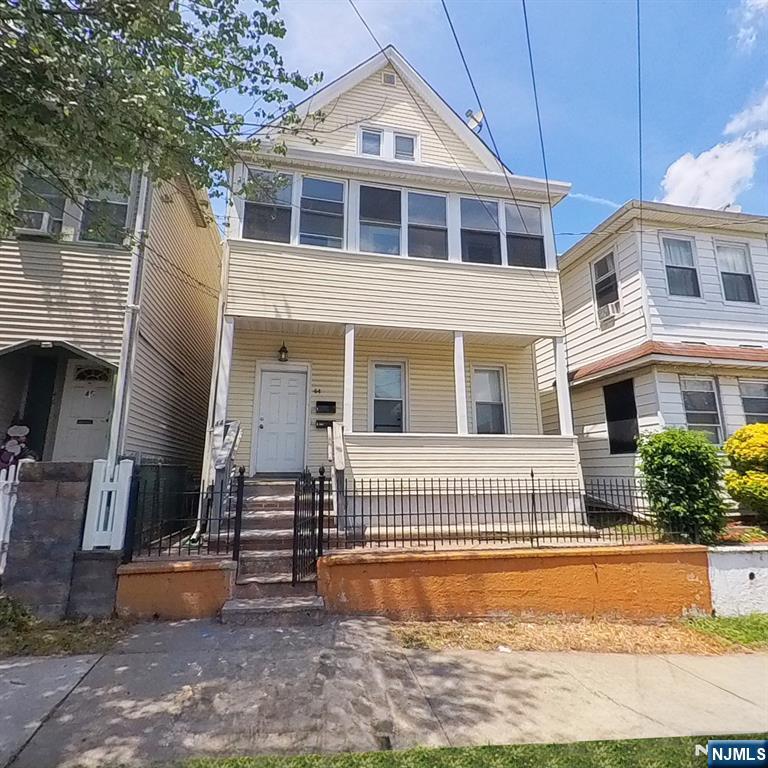 Attention investors, contractors, and builders! Incredible value in a highly desirable Clifton neighborhood. This classic 2 family home offers a fantastic layout with massive rental or resale potential. Each unit features a spacious living room, along with newer kitchens and bathrooms already in place. The second floor layout is further expanded by a finished attic offering 3 additional rooms, perfect for a duplex setup, home offices, or massive storage. The mechanicals are a major bonus: separate heating systems and separate central air (C/A) units for each apartment, allowing tenants to pay their own utilities! The property is being sold strictly AS-IS. It requires repairs, updates, and has known structural issues. This project is ideal for a contractor or cash/rehab buyer looking to cure the structural elements and unlock instant equity. Don't miss this!