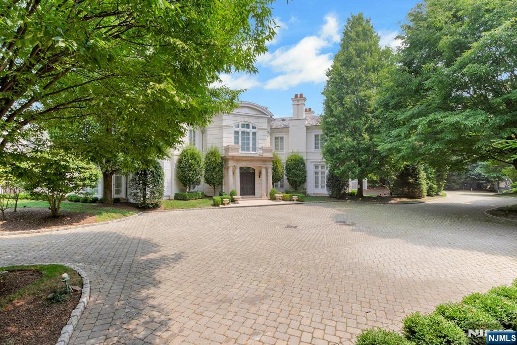 Set in one of Alpineâ€™s most prestigious enclaves just 8 miles north of NYC, this extraordinary 20,000sq.ft. Boris Baranovich designed, Joe DiStaulo built estate embodies refined luxury and grand-scale living. Fully gut-renovated just 3 years ago, the residence seamlessly blends timeless elegance with modern sophistication. The home features 6 expansive family bedroom suites, each thoughtfully designed for comfort and privacy, along with 3 separate staff quarters. Designed for both intimate gatherings and lavish entertaining, the estate boasts 5 impressive public rooms, including a banquet-sized dining room, an elegant living room, and a warm, inviting family room. A standout feature is the spectacular indoor pool complex, housed in its own wing beneath a soaring cathedral ceiling and complete with a water slide for year-round enjoyment. An indoor sports court, 14 seat movie theater, professional gymnasium, playroom and billiards room are all interior recreation spaces. Outdoors, the amenities continue with a beautifully designed pool, a pool house, and a regulation-size tennis court with lighting for evening play. The exterior showcases classic stucco construction topped with a distinguished slate roof, while a gated entrance and sweeping circular driveway provide both privacy and a dramatic sense of arrival. This is a rare opportunity to own a truly exceptional estate in Rio Vista Alpine. Elevator to all levels, four car-garage, and full house generator.