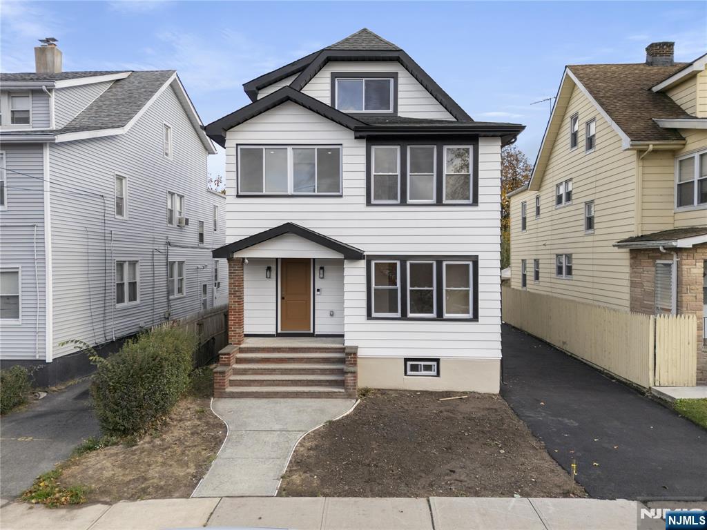 Exceptional fully renovated multi-family opportunity in the highly desirable Ampere section of Bloomfield! This impressive property features 2 beautifully updated residential units plus an additional studio space on the third floor, offering incredible flexibility for investors or owner-occupants alike. Completely rebuilt from top to bottom, inside and out, the property delivers the feel, design, and quality of new construction while maintaining classic neighborhood charm.Each main unit features bright and airy layouts with beautiful wood flooring throughout, brand-new energy-efficient windows, spacious living areas, and modern neutral finishes. The chef-inspired kitchens showcase quartz countertops, custom cabinetry, and stainless steel appliances, including refrigerators, stoves, and microwaves. Fully renovated spa-like bathrooms feature sleek tilework and contemporary fixtures. One of the units includes a bonus office/sitting area attached to the primary bedroom, ideal for today's flexible lifestyle needs. The additional third-floor studio provides excellent potential for extended living space, home office setup, guest accommodations, or added rental income possibilities. Major upgrades throughout the property offer peace of mind and a true maintenance-free experience for years to come. 2 sets of Laundry Hookups and storage for each unit is provided in the finished basement. Close to Grove St Train Station and Bloomfield Ave.