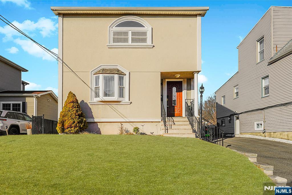 Step into this beautifully renovated 3-bed, 2.5-bath Colonial, blending classic charm with modern luxury. Nestled in one of Nutleyâ€™s most sought-after neighborhoods, this move-in-ready home is minutes from parks, top schools, shopping, & transportation. From the moment you enter, you'll love the bright, open layout designed for comfort and style. Gleaming hardwood floors lead to a chefâ€™s kitchen with granite countertops, modern appliances, and custom cabinetry. The seamless flow between the living, kitchen, and dining areas makes it ideal for daily living or entertaining. Upstairs you will find 3 spacious bedrooms, including a primary suite with cathedral ceilings, skylight, walk-in closet, and a spa-like bath with Jacuzzi tub. Need extra space? The finished basement with half bath is perfect as an office, playroom, gym, or media lounge. Step outside to a private backyard retreat, ideal for BBQs or relaxing. This home has it allâ€”style, space, and location!