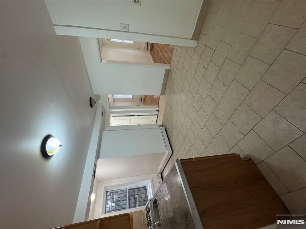 Large, freshly painted 3-bedroom ground-floor apartment conveniently located close to shopping, transportation, parks, and schools. This bright and spacious unit offers comfortable single-level living with generous room sizes and great natural light. Enjoy the added bonus of a private side yard space.