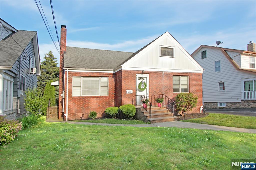 Located On A Lovely Tree Lined Street, This OVERSIZED Well Maintained l944 CAPE COD Offers Over 1,600 Sq/Ft Of Roomy Living Space!! This Well-Built, Entirely Brick Home, Offers The Following Features: Extra Long Driveway Providing At Least 4 Parking Spaces, Nice Size Back Yard, Attached Garage, A Main Supporting Steel Beam Enhances The Sturdiness of The Home. Inside Features Include: Oak Hard Wood Floors JUST Refinished, Freshly Painted Walls, Oak Wood Trim, Large Living Room With Picture Window And Original Stone Fireplace, Two Well-Sized Bedrooms, Full Bathroom, Kitchen, Dining Room & Sunroom Complete The First Floor. The Second Floor Boasts An Extraordinarily Large Bedroom With Additional Space For An Office and Den Area. It Can Be An Amazing Primary Suite With Abundant Closet & Storage Spaces. Cedar Closets Throughout. Huge Finished Basement With Laundry Room, Utility Room, Rec Room And Half Bath. So Convenient To Schools, Retail, Dining, Public Golf Course, Clara Maas Hospital, Highways and Nutley!! Furnace Only Three years Old! Showings Start Monday, June 16th. Hope To See You!