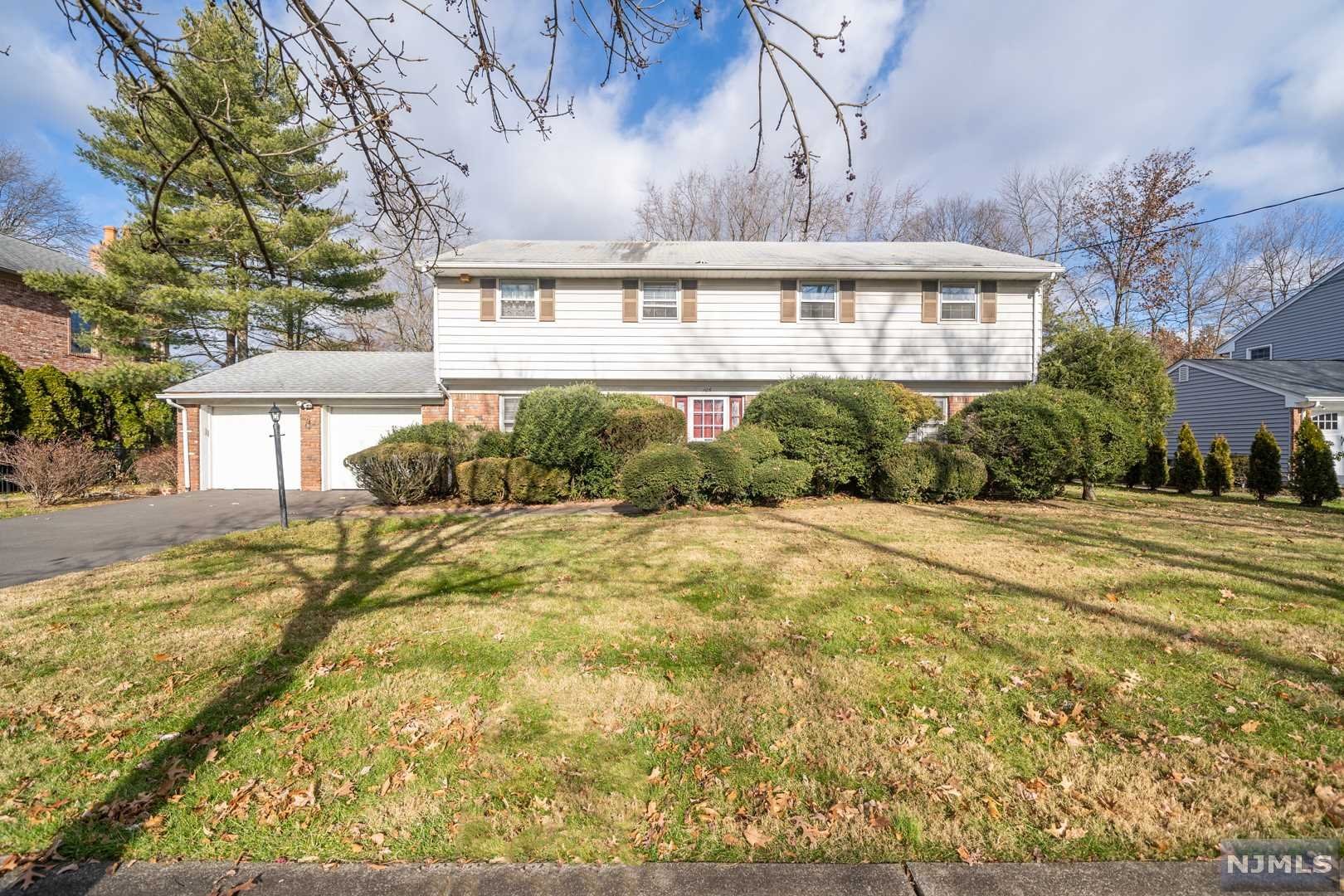 Welcome home to the best section of Oradell on White Beeches Golf Course! This spacious 3,402 Sq Ft colonial is located on a beautiful tree-lined street directly on the golf course and is ready for you to renovate and customize. Main features are an in-law suite, two staircases to the upstairs bedrooms + office, 2 car garage, and a partially finished basement with ample ceiling height. Walk inside the first floor and find a formal dining room, large living room, family room, eat-in kitchen, in-law suite, glass sliders to rear yard and 2 car garage. Second floor features the bedrooms, three seasons room, and master suite with staircase down to first floor. Basement is partially finished with ample ceiling height, utilities, and work station area. New Hot Water heater in 2020. Spacious green grass backyard great for bbq's and outdoor activities with family and friends. Potential to add a pool. Located in Blue Ribbon School District. Won't last long, inquire today before its sold