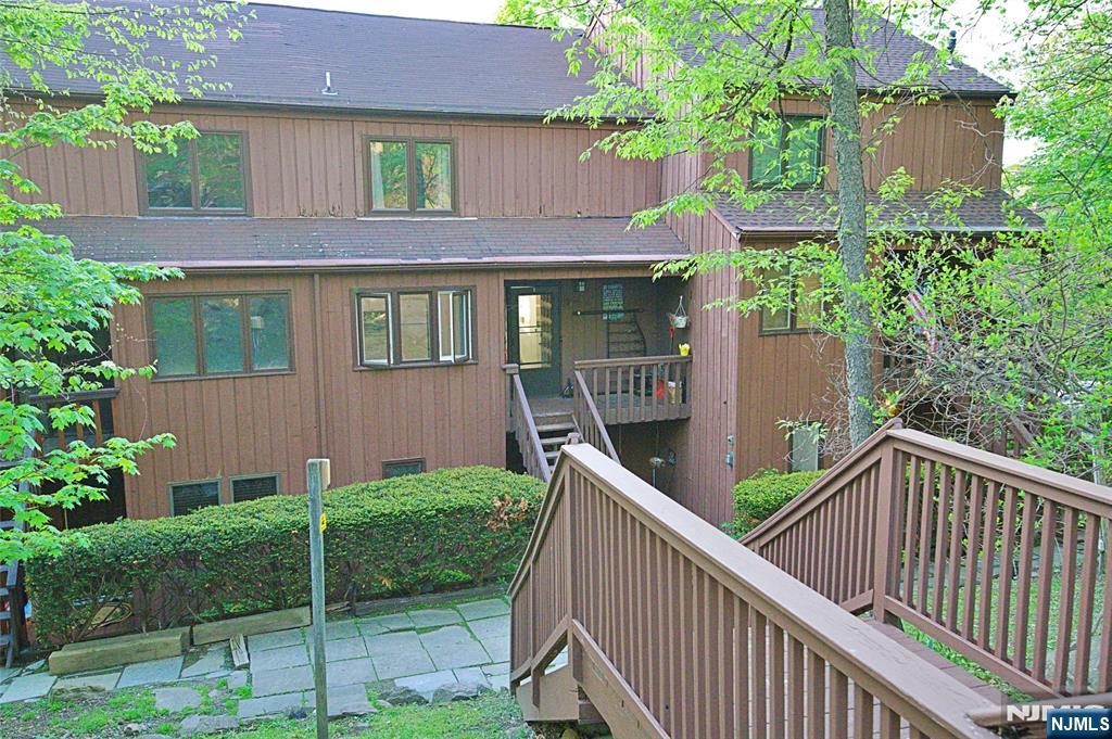 Why rent when you can own! Here is a 2 bedroom 1.5 bath townhome in the quiet complex of Hidden Village. Tucked away on your own private mountainside. Enjoy mountain views and easy living close to town and ski slopes and summer parks including Mountain Creek! This townhouse was recently updated with newer kitchen cabinets and appliances, newer bathroom vanities, and toilets, new sliding glass doors and has hardwood floors, central heat and air, one parking space, large storage room, private deck and expansive living areas on multiple floors. In addition there is lake access for fishing! Don't miss out on this wonderfully maintained home!