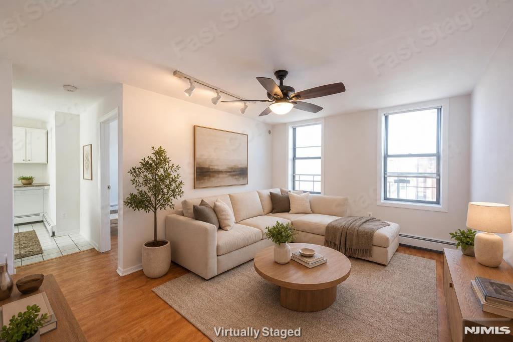 Step into a home that simply makes sense. Unit 11 at 787 Summit Ave offers the balance todayâ€™s buyers are searching for: space, convenience, natural light, and real value in one of Jersey Cityâ€™s most connected locations. This residence delivers a comfortable and functional layout designed for everyday living. The living area feels open and welcoming, with sunlight that gives the home warmth throughout the day. The kitchen flows naturally into the space, making it practical whether youâ€™re hosting friends, working from home, or just enjoying a quiet evening after the city rush. What truly separates this home is the lifestyle around it. Located near transportation, shopping, dining, and major commuter routes, Unit 11 puts you within reach of Manhattan while still giving you a place that feels grounded and livable. In a market where many properties feel rushed or overpriced, this home presents an opportunity buyers can actually feel confident about. No gimmicks. No inflated promises. Just a well-positioned Jersey City home with strong everyday appeal, smart accessibility, and the kind of potential that continues to matter long-term. For buyers tired of compromising between price, location, and practicality â€” this may be the one worth seeing in person. Commuters will appreciate the nearby NY and JSQ bus stops, also within walking distance to Journal Square and PATH trains.