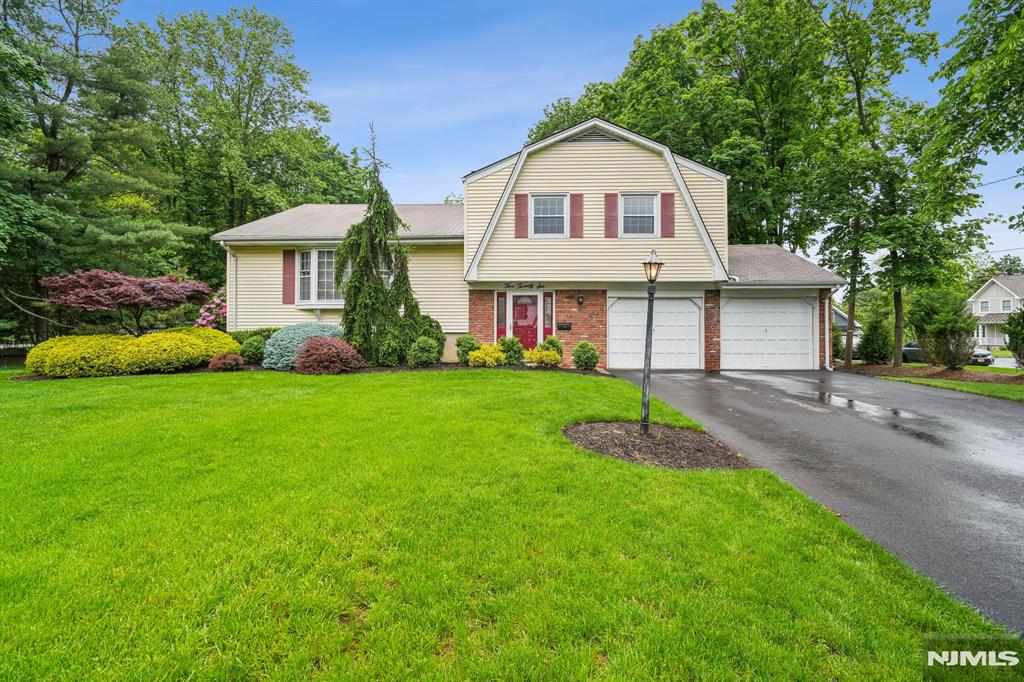 Set on a rare and expansive flat lot offering exceptional privacy, this oversized, custom-built Sugar Maple Split features 3 bedrooms, 2.5 baths, and a two-car attached garage. The home boasts a classic layout with generously sized rooms, hardwood floors (under carpet), and a lower-level family room with a half bath and direct garage access. The primary bedroom includes its own full bath and ample closet space, while two additional bedrooms offer great storage and natural light. A finished basement office with a private entrance provides the perfect setup for working from home, hosting guests, or future expansion. Move-in ready, the home also presents a great opportunity for stylish updates over time. One of the propertyâ€™s standout features is a substantial detached garage located in the rear corner of the lot, complete with separate electric metering. Itâ€™s ideal for generating rental income, running a home-based business, or removed to extend your compound. Located in highly desirable River Vale renowned for its top-rated schools, beautiful parks, and convenient shopping and dining. Whether you envision expanding the footprint, creating an outdoor retreat, or simply enjoying the privacy, the possibilities are endless. 526 Cleveland Ave is a unique and exciting opportunity to create the lifestyle you've been dreaming of all in a location that truly has it all. Offers due by 6/5 3pm contact Ani with any questions 201-913-6678