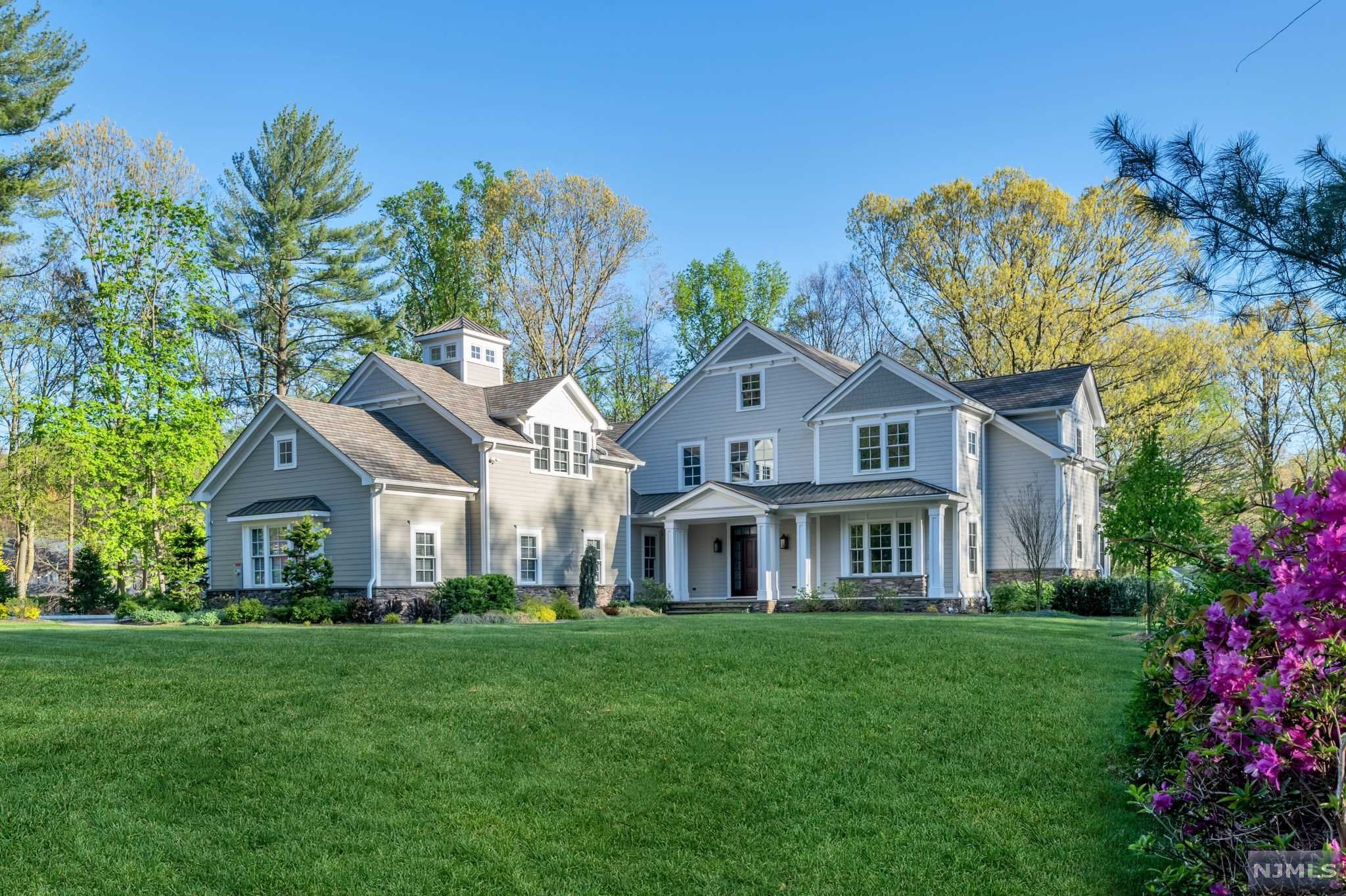 RARE OPPORTUNITY TO OWN NEWER CONSTRUCTION IN THE MOST TRANQUIL LOCATION & SETTING. THIS CUSTOM BUILT FARM HOUSE IS A DREAM WITH ALL IT HAS TO OFFER. GORGEOUS HARDWOOD FLRS, HIGH CLGS,EXT TRIM WORK. LOCATED ON A PRESTIGIOUS COUNTRY LANE, SURROUNDED BY NATURE & VIEWS. UPON ENTRY YOU WILL BE WOWED WITH THE ATTENTION TO DETAIL, 1ST FLOOR PRIMARY SUITE (OR GUEST SUITE) W/SITTING RM. FABULOUS CHEF'S KITCHEN W/HIGH END APPLCS, WALLS OF WINDOWS & OPENS TO FAMILY RM W/COFFRD CLG & FP. ENTRY TO PRIVATE OUTDOOR LIVING SPACE. CUSTOM MUD ROOM, LNDRY RM,PET AREA & BANQUET SIZE DINING RM COMPL THE 1ST FL. 2ND FL OFFERS A SECOND PRIMARY SUITE W/LUX BATH, WIC'S. 2 ADDT'L BR'S W/OVERSIZED BTH. 3RD FLOOR OFFERS A FANTASTIC BONUS AR PERF FOR OFFC, STUDIO OR PLAY RM W/HALF BTH. LOWER LEVEL IS A DREAM W/WINE CELLAR, REC ROOM, GYM, YOGA STUDIO , MEDIA ROOM AND FULL BATH. SO MUCH STORAGE TOO. 3 CAR GARAGE,FRONT & SIDE PORCH, GENRT, SECR, WALK UP ATTIC, HEATED PATIOS, TOO MUCH TO LIST!