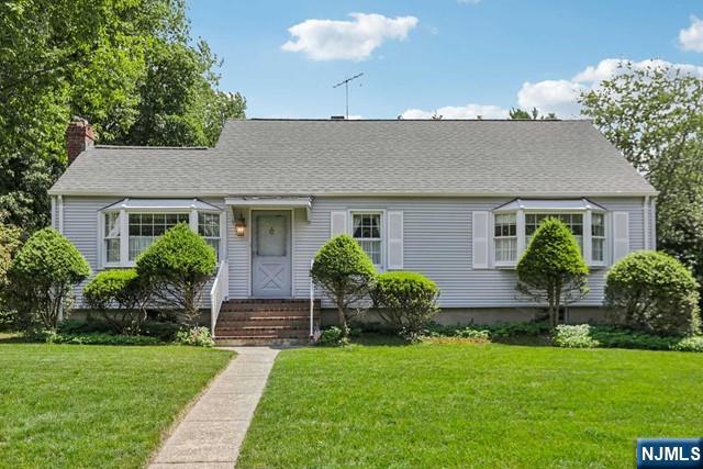 Welcome to this charming two-bedroom ranch located on level .6-acre property in prestigious Franklin Lakes. Living room w/wood burning fireplace & bay window, Dining room w/built in cabinetry, newer kitchen, two bedrooms, an updated bathroom, *large den w/wood paneled walls & an outside entry. The walk-up attic offers extra storage room. There is a full size partially finished basement w/laundry, a one car garage, hardwood floors, central air conditioning, newer windows, updated septic & mtce free vinyl sided exterior. Great alternative to condo or townhouse. Conveniently located close to shopping, schools, parks & houses of worship.*could possibly be used as a 3rd bedroom
