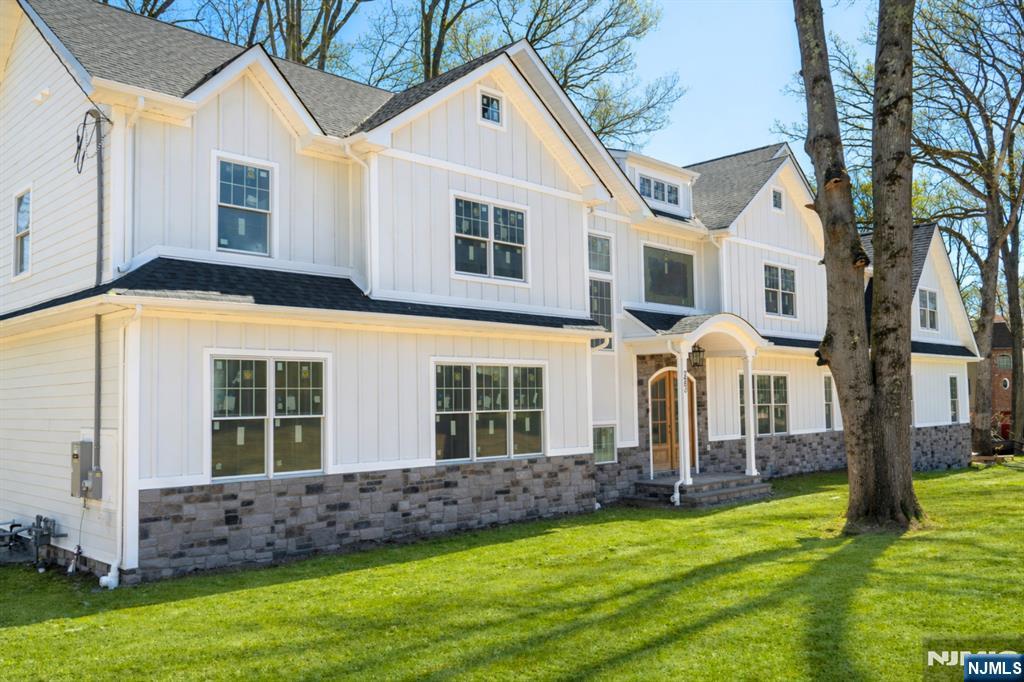 Enjoy the summer on the lake! Lakefront living in the exclusive Shadow Lake Estates. New Construction Experience elevated lakefront living in the exclusive Shadow Lake Estates. This custom-built Colonial offers 5 bedrooms, 5 full bathrooms, and 2 half bathrooms across three thoughtfully designed levels, all showcasing beautiful lake views. The main level features a grand foyer, formal living and dining rooms, a gourmet chefâ€™s kitchen with center island and pantry, and a spacious family room with fireplace. A guest suite with a private en-suite bath completes the first floor. The second level is highlighted by a luxurious primary suite with walk-in closets, a private dressing room, and a spa-inspired bathroom. Three additional bedrooms, each with en-suite baths and walk-in closets, complete the upper level. The finished lower level provides a recreation room, media lounge, and ample storage space. Residents enjoy exclusive, membership-based lakefront amenities including a clubhouse, pool, boating, tennis, pickleball, basketball courts, scenic walking trails, and more. Ideally located just minutes from shopping, dining, and everyday conveniences. Finishes are underway, with construction nearing completion. There is still time to personalize select details. Private showings are available.