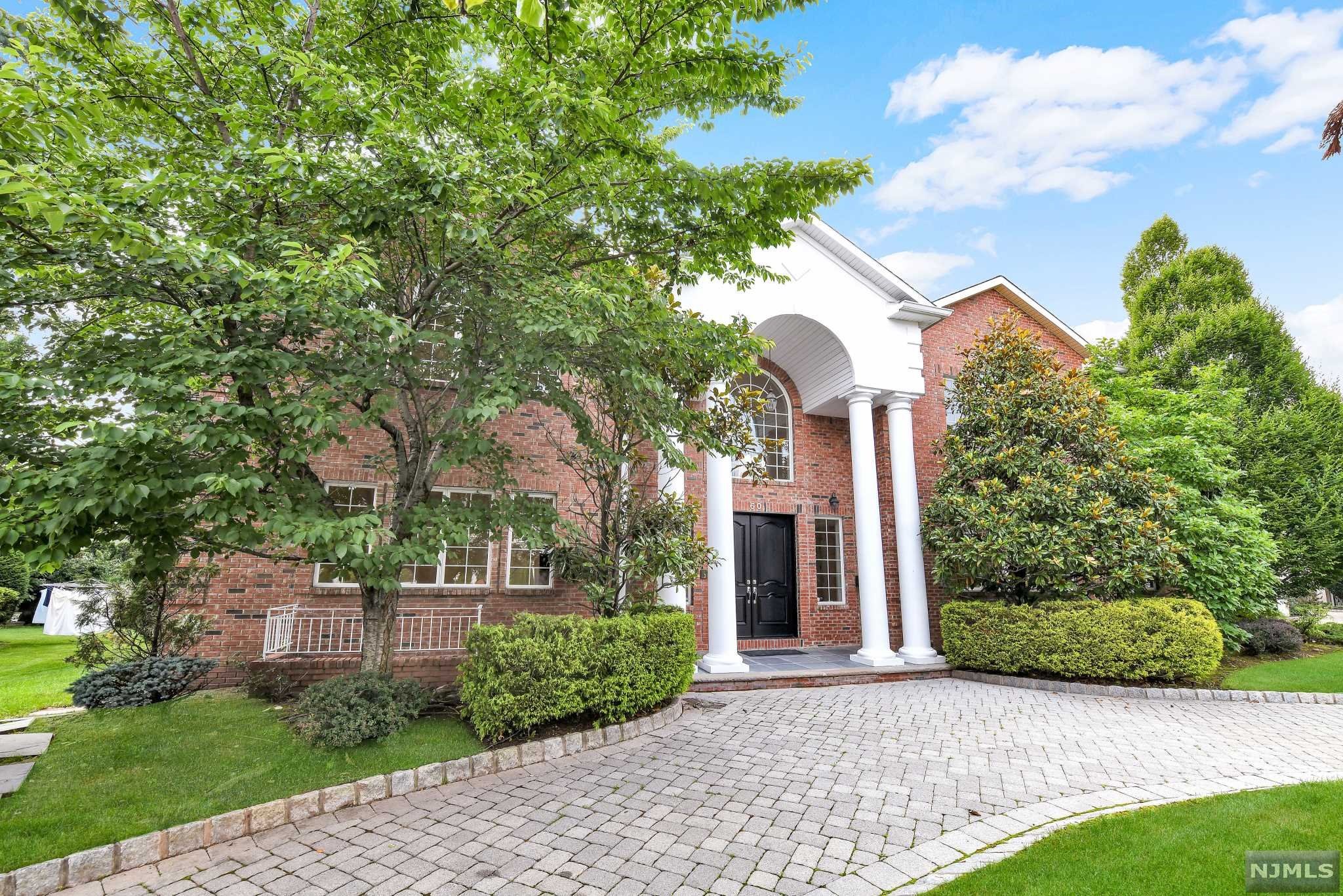 First time offered since full home renovation!!! Prime Location North Englewood Cliffs!!! All brick magnificent builder's home with top amenities, radiant heat, marble foyer, marble baths, high ceilings through out, 14 zone heating, truly a masterpiece. Custom Kitchen w/Viking Stove ,Sub Zero and butler staircase. This amazing home offers 8 En-Suite Bedrooms including one on the first floor!!! The magnificent beautiful master suite with fireplace features a marble master bath with radiant heat. Walk through laundry room upstairs, hardwood floors through out, details galore. Full finished walkout basement with 10ft ceilings and large windows, movie theater, wine cellar and custom wet bar. Paver circular drive way, 3 Car Garage and private backyard. Located only minutes from Manhattan in one of the most desirable areas.