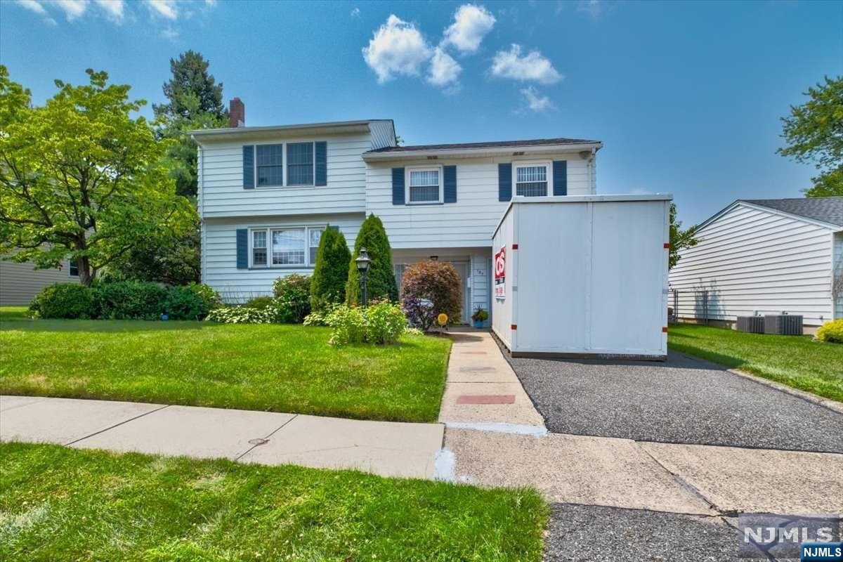 This home is move-in ready and features many upgrades, including new flooring, fresh paint, and updated appliances. The home is also conveniently located close to Route 46, the Garden State Parkway, shops, and restaurants.This well-loved and cared-for home is a rare find. Don't miss your chance to own this beautiful home!The home is approximately 2,500 sq feetThe backyard is fenced in.The home is close to public transportation. The home is close to public transportation.