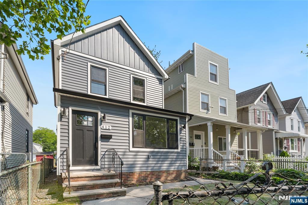 Welcome to 412 Davis Ave! A beautifully renovated home conveniently located in the Arlington Section of Kearny. Main floor features an open floorplan with hardwood floors throughout, modern kitchen with slim shaker cabinets, quartz countertops, stainless steel appliances, entryway mud closet, powder room, and bedroom. Sleek staircase featuring led stair-wall lighting leads up to the second floor where you'll find 2 more bedrooms and a full bathroom.