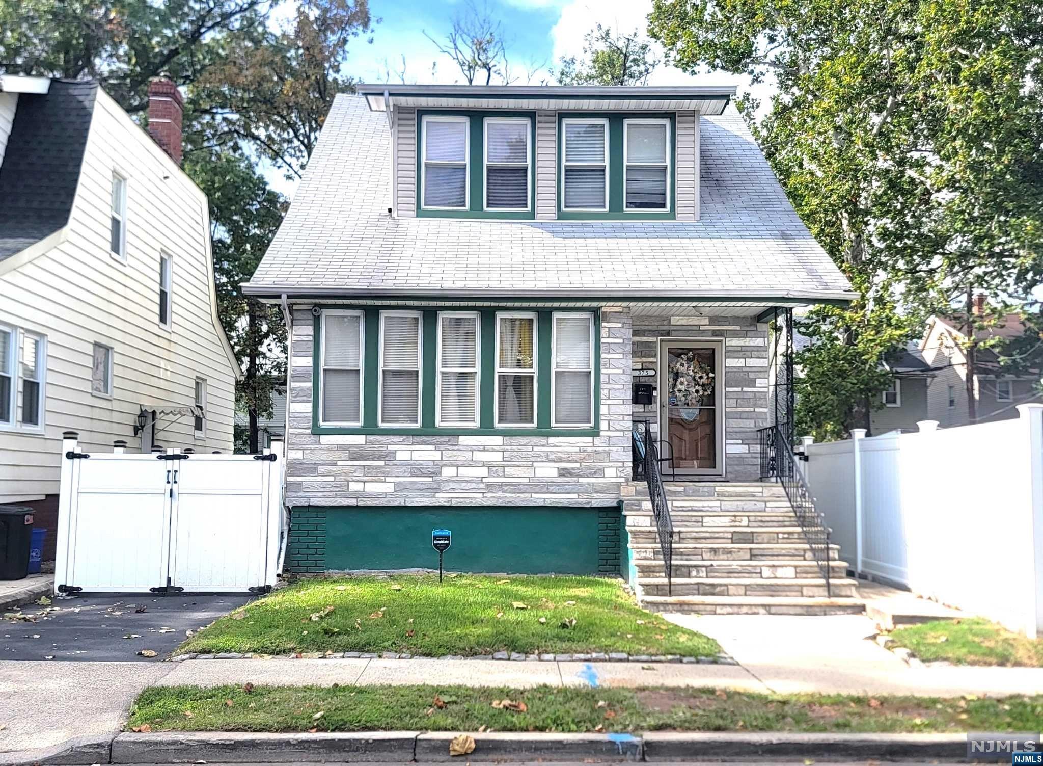 Turn-Key Updated Colonial w/Cozy Front Porch! First floor features Open Floor Plan Living Room w/Fireplace, Dining Room, Modern Eat In Kitchen with Center Island, Granite Countertops & SS Appliances, Butlers Pantry, & 1/2 Bath. 2nd floor offers 3 Bedrooms and Full Bath. Basement is Full & Unfinished. Plenty of Parking with Private Driveway which fits 4+ Cars & 2 Car Detached Garage. Home is centrally located close to parks, shopping & mass transit stops. Also close to GSP and Rt 280. A Must See!!!