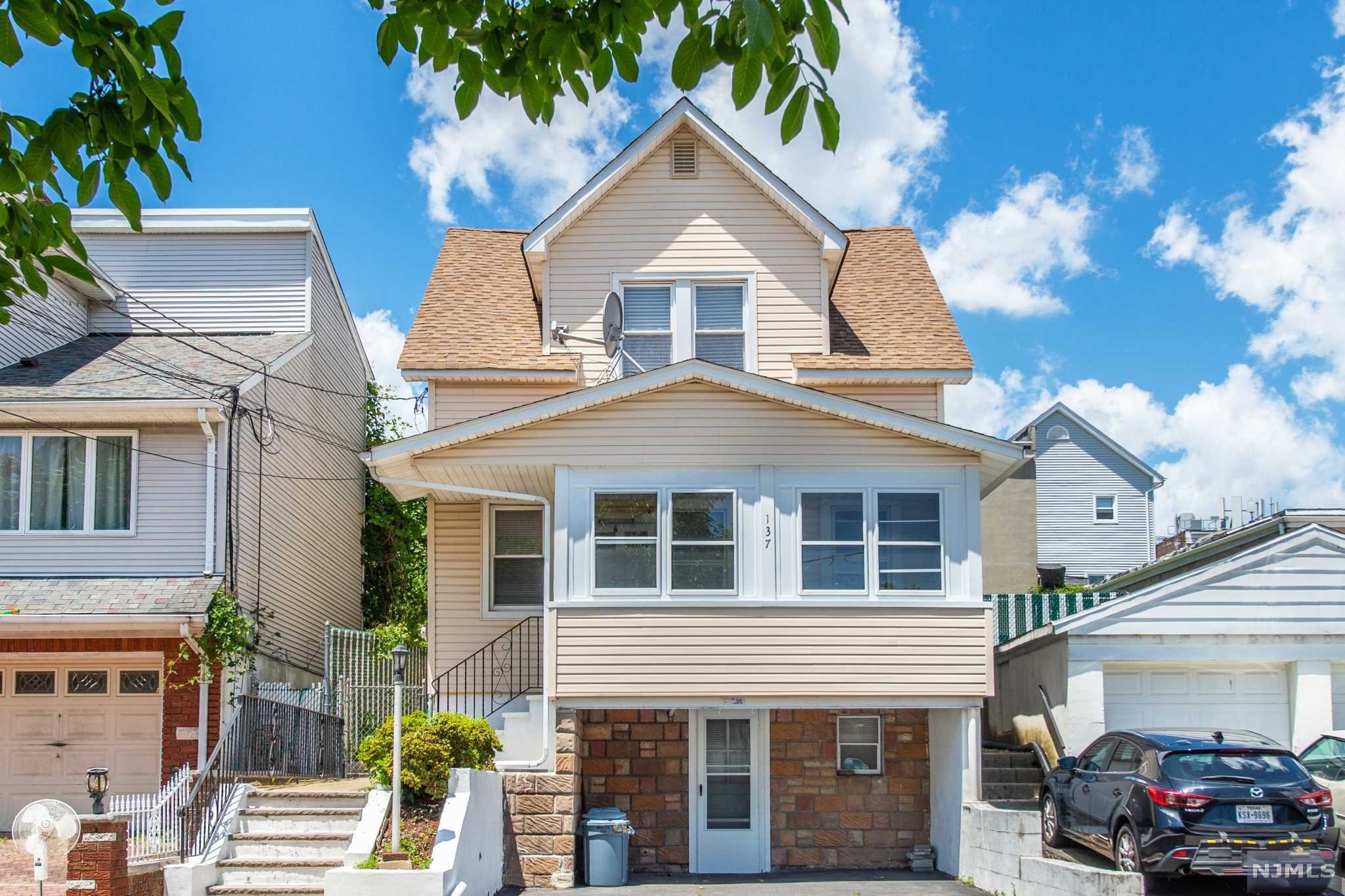 Well maintained sidehall colonial in Garfield! Recently re-done bathrooms and kitchen. One bedroom on the ground floor, 2 bedrooms upstairs. Partially finished basement with laundry. Nice size yard with patio area.