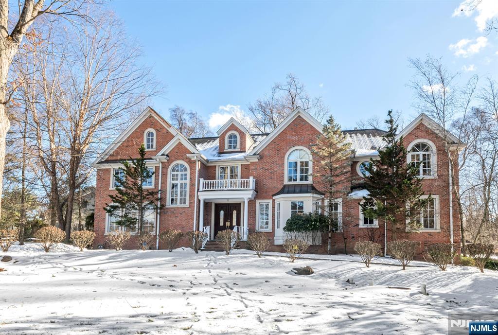 Nestled in a highly sought-after neighborhood is this all brick manor. With a stunning 2-story EF, a grand 2 story great rm w/onyx FP, banq size DR, inviting office w/custom built-ins & a coffered ceiling provides an ideal work-from-home space. A gourmet kitch w/oversized island, & a sunny brkfst rm w/ doors to a private deck overlooking the deep lush property. A convenient 1st fl BR, full bath, & oversized laundry room. The 2nd Fl offers a grand mezzanine, lux primary suite w/FP, vaulted clg, sitting area, steam shower, soaking tub & a dream walk-in closet. A spacious jr ensuite, 2 addtâ€™l large BRs w/ a Jack & Jill bath. The lower level is an entertainerâ€™s paradise, featuring a large rec room, media room w/bar, a soundproof rmâ€”ideal for an office, wine cellar, or music rm. There is a full bath, mudrm, & access to the 3-car garage. Addtâ€™l highlights incl a generator, paver DW, close to exceptional schools, & transp. This home offers the ultimate in luxury & comfort!