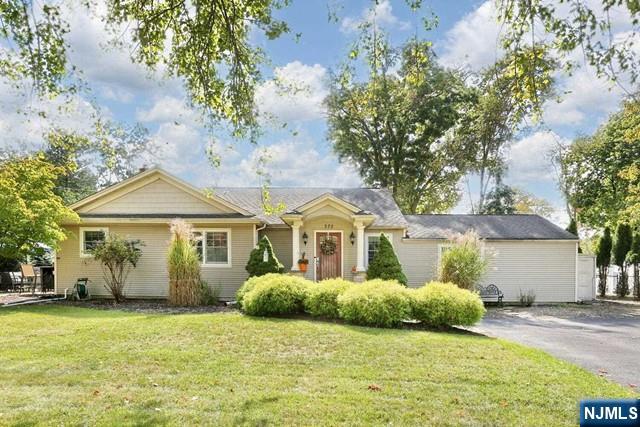 Situated in desirable neighborhood in northern River Vale. Spacious Split on large property. Updated Kitchen with granite counters and center island.with access to private cozy side patio space..Spacious Living Room and Dining Room with hardwood floors..Oversized family Room with high ceiling and sliders to rear patio. 2nd level has 3 Bedrooms including Primary Bedroom with Primary Bathroom /shower...Lower level/ground level has Home office/rec room & laundry with 1/2 Bath & 4th bedroom. \Central Air Conditioning..Close to top Rated River Vale Schools..Golf courses ,Seasonal Farmer's Market..EZ NYC Commute by Car, Bus and Rail..Contact Liz Ruckdeschel Coldwell Banker 201-522-4020