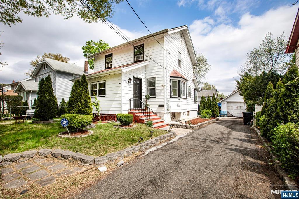 A well maintain colonial in nice quiet residential area of Teaneck close to major transportation, Hospital and shopping center. Enclosed porch, Living room, Dinning room, Elk w/ Breakfast area plus a full bath, Second floor small office, full bath,Br,Br.Br,' Finish attic and semi finish baseman with full bath. Newer Kitchen.Freshly painter interior and exterior .Detach one car garage plus parking space.