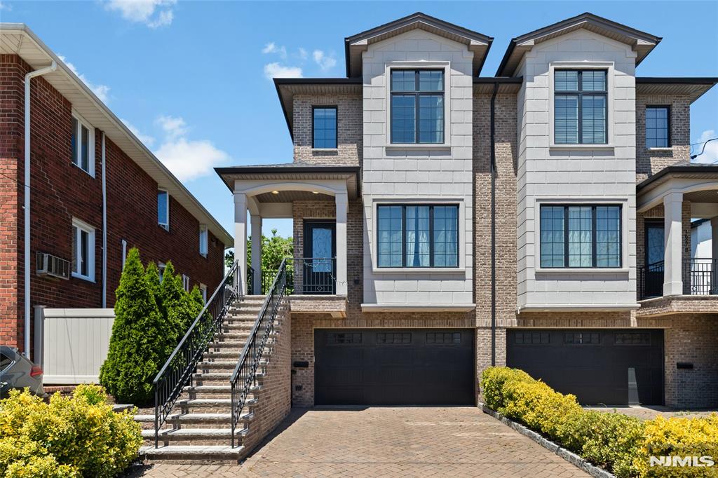 Luxury Fort Lee Rental! Welcome to this newly built duplex-style townhouse featuring 3 bedrooms, 2 full bathrooms, and 2 half bathrooms across multiple levels of modern living space. This bright and spacious home offers an open-concept layout with high ceilings, hardwood floors, abundant natural light, and a beautifully appointed kitchen with modern finishes and ample storage. The second level features all three bedrooms, including a spacious primary suite, as well as a convenient laundry area. Additional flexible living space on the ground level is perfect for a home office, gym, or recreation room. Enjoy the convenience of an attached 2-car garage plus 2 additional driveway parking spaces, along with use of the private backyard for relaxing or entertaining. Pet-friendly and ideally located near shopping, dining, parks, major highways, and NYC transportation, this home offers the perfect combination of comfort, style, and convenience. Book your appointment today!