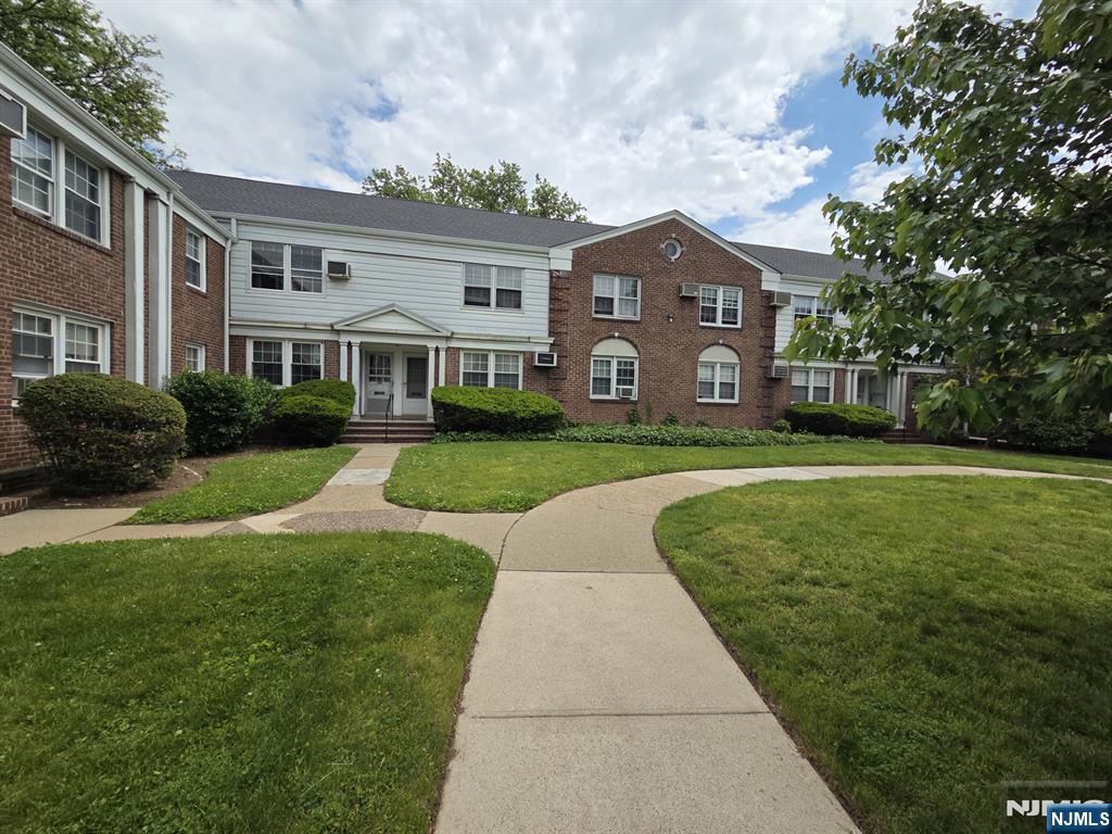 Welcome to Parkview Co-Op in Elmwood Park, a sought-after 55+ adult community offering comfortable, low-maintenance living in a peaceful setting. This well-maintained first-floor 1-bedroom, 1-bath unit features a spacious layout with a generously sized living room and beautiful hardwood flooring throughout. The home also offers a separate dining area, tiled kitchen with wood cabinetry, and a sizable bedroom with ample space and comfort. Enjoy the convenience of easy first-floor accessibility and a functional floor plan designed for everyday living, all ideally located near shopping, dining, transportation, and major highways