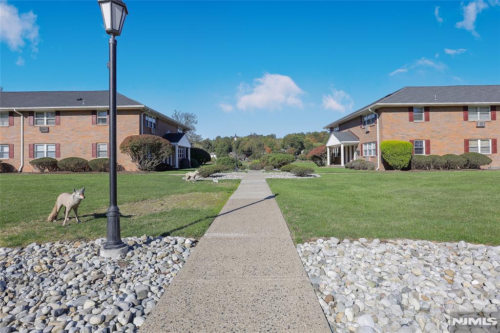 Location, location, location - Welcome to Park Ridge Crossing! Sun Filled 2nd floor Condo located in one of Park Ridge's most desirable locationsâ€”just a short walk to the train, restaurants, shops, and local services. Oversized windows flood the space with natural light, while a built-in closet system and extra storage provide practical convenience. Off-street parking is included, adding incredible value and everyday ease in this prime location. Enjoy peaceful walking trails nearby, all with the benefit of low maintenance fees that make this an ideal opportunity for first-time buyers, downsizers, or anyone seeking easy, affordable living in a prime location. Create a space that suits your personal taste and lifestyle.