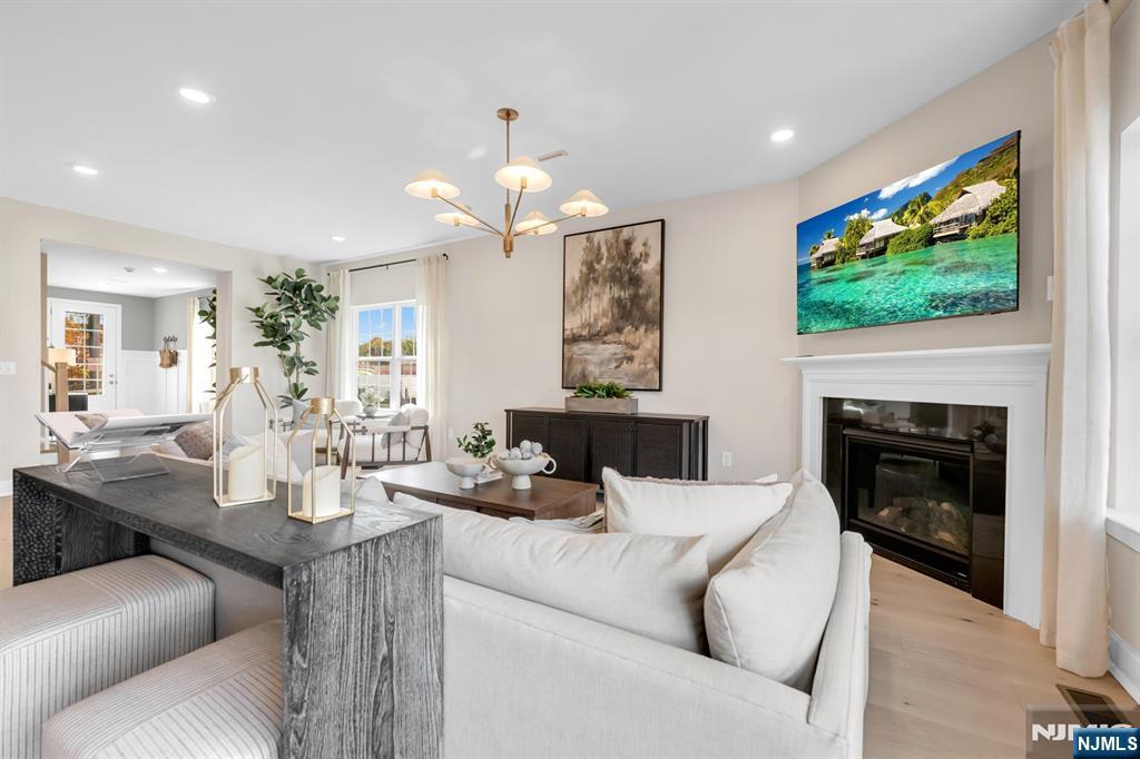 Welcome to The Ridings, a brand-new luxury townhome community in the heart of Oakland, NJ. Surrounded by a gorgeous natural setting, this sought-after neighborhood offers a wonderful sense of community, top-rated schools, and convenient access to everything Oakland has to offer. Built by renowned builder Lennar, these expansive, brand-new residences boast 3 levels of beautifully finished living spaces, featuring 3 bedrooms and 3.5 bathrooms. The main level showcases an open-concept layout with a spacious living and dining area flowing seamlessly into the luxe kitchen, appointed with a huge center island, perfect for entertaining. Upstairs, youâ€™ll find a central loft lounge, 2 guest bedrooms, a full bathroom, & the luxurious Primary Suite with dual walk-in-closets and a spa-like bath. The fully finished lower level offers a large recreation room and a 3rd full bath, providing endless possibilities for use. Additional highlights include a two-car garage, private outdoor patio space, and access to exceptional community amenities such as a pool and clubhouse, all with the ease of a maintenance-free lifestyle. Quick move-in dates available!