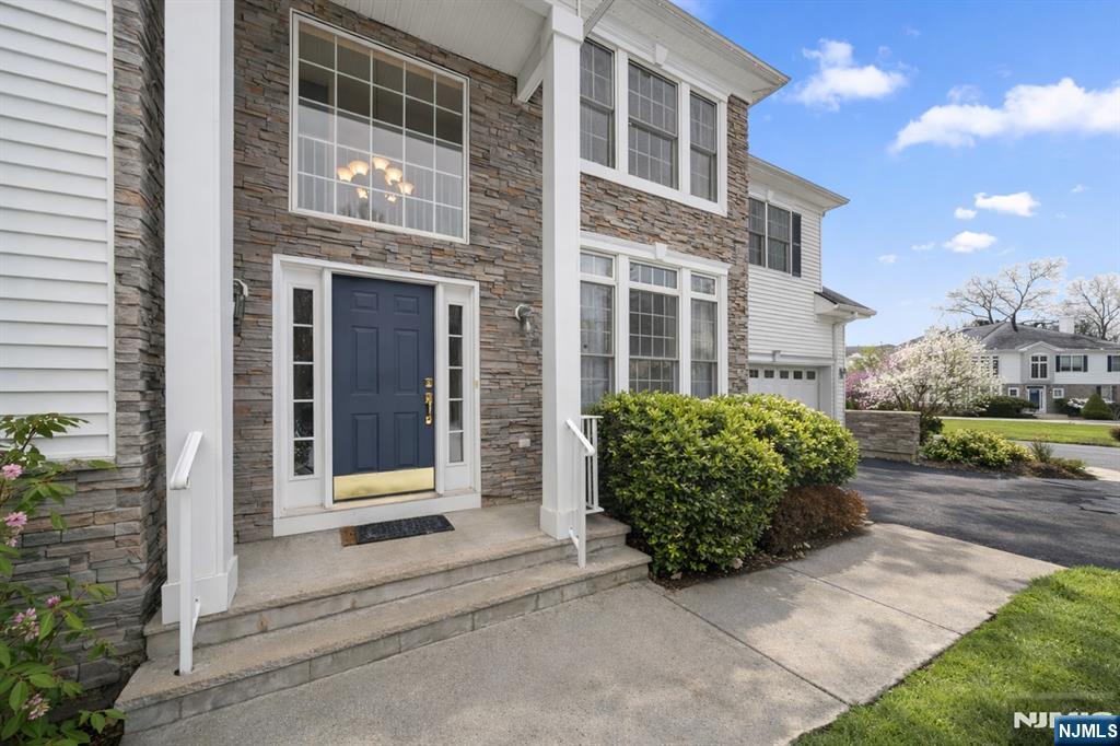Welcome to 48 Bovensiepen Court, Roseland, NJ. An exceptional townhome offering the perfect blend of space, style, and functionality. With over 3,180 sq. ft. per tax record, this is one of the largest models in the community. This beautifully maintained 3-bedroom, 1 den/bonus room, 2.5-bath residence is thoughtfully designed for comfortable daily living and effortless entertaining. The bright, open floor plan is filled with natural light and features a private entrance. Spacious living areas flow seamlessly into the dining room and kitchen, showcasing modern finishes, ample cabinetry, and generous counter space. The inviting family room offers a cozy fireplace and opens to a private backyard retreat, ideal for gatherings, outdoor enjoyment, or peaceful morning coffee. Upstairs, a sun-drenched and generously sized sitting area adds additional living space and comfort. The huge primary suite features its own private sitting area, abundant closet space, and a well-appointed en-suite bath, creating a serene and luxurious retreat. Additional bedrooms are generously sized and thoughtfully designed. The third-floor den/bonus room provides flexible space, perfect for a home office, guest room, private gym, or additional storage. Located in one of Roseland's most desirable neighborhoods, this townhome is conveniently close to parks, shopping, dining, major highways, and public transportation. Disclaimer: All exterior photos have been virtually enhanced.