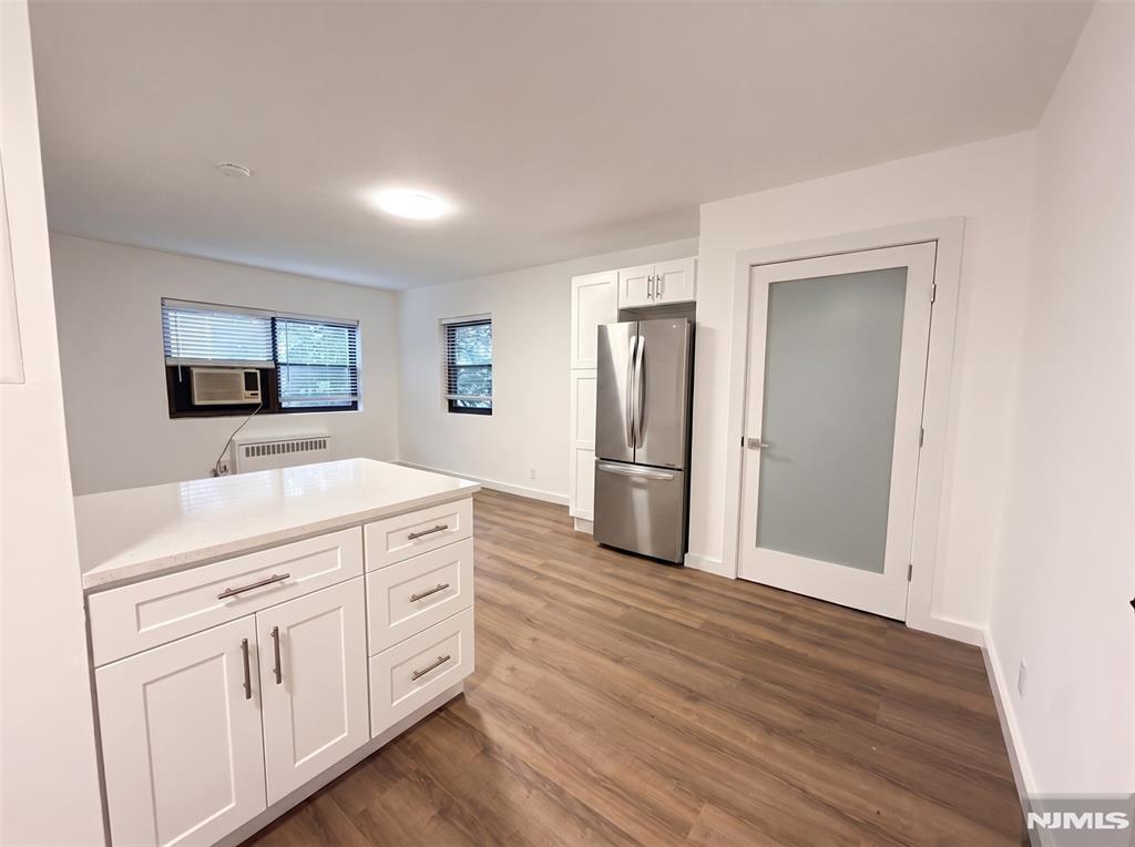 CALL BRANDON ESPER 201-916-6066. Completely renovated first-floor studio located in the highly desirable Linwood Park community. This move-in-ready home has been thoughtfully updated from top to bottom, featuring a brand-new kitchen, new flooring, fresh paint, new doors, modern hardware, updated lighting, stylish fixtures, a beautifully renovated bathroom with a new shower, and brand-new appliances. One of the biggest advantages of this unit is its true first-floor locationâ€”offering the convenience of no neighbors below you. Unlike many first-floor units, however, this apartment is not at ground level. The elevated position provides a more open feel and a pleasant view from the windows, giving the impression of being several floors up while still enjoying easy first-floor access. The low monthly maintenance of just $391 includes heat, hot water, cable, internet, property taxes, and common area maintenance, making ownership both affordable and convenient. Ideally located near shopping, restaurants, major highways, public transportation, and everything Fort Lee has to offer, this is an excellent opportunity to own a beautifully renovated home in one of the area's most sought-after co-op communities.