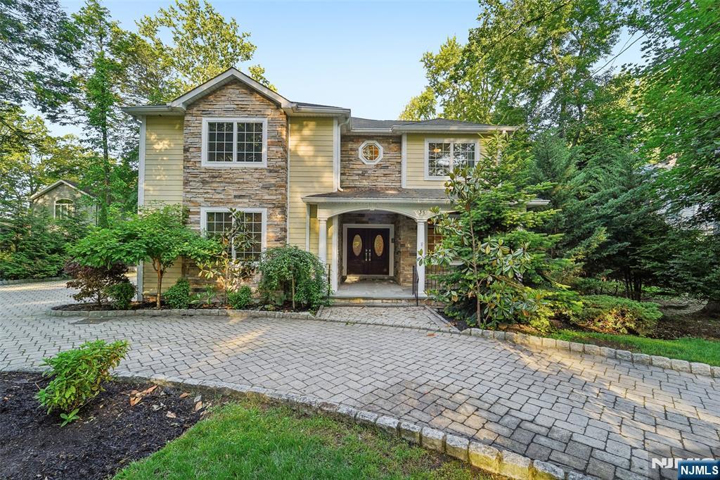 TRULY ONE OF A KIND 2007 CUSTOM BUILT COLONIAL HOME SITUATED ON OVER AN ACRE OF PROPERTY WITHIN CLOSE PROXIMITY TO RESTAURANTS, SHOPS, AND TRANSPORTATION. SITUATED PRIVATELY OFF THE ROAD BUFFERED BY PLANTINGS & CIRCULAR PAVER DRIVEWAY. TWO STORY ENTRY W/ RADIANT HEATED FLOORS, FRONT-FACING PRIVATE OFFICE, BILLIARDS ROOM W/ WALL OF WINDOWS (2016), OVERSIZED FORMAL DINING ROOM, FRENCH DOORS TO PAVER PATIO & PERGOLA, CHEF'S DELIGHT CUSTOM KITCHEN W/ ALL VIKING APPLIANCES, GRANITE COUNTERS/ISLAND SEATING, RADIANT HEATED FLOORS, LARGE BREAKFAST AREA W/ ACCESS TO OVERSIZED DECK, GREAT ROOM W/ FPL & ACCESS TO DECK, POWDER ROOM W/ RADIANT HEAT, ACCESS TO 2 CAR GARAGE COMPLETE THE MAIN FLOOR. SECOND FL OFFERS LARGE LANDING OVERLOOKING THE BILLARD ROOM, WROUGHT IRON DETAILED BANISTERS/RAILING, 2 BEDROOMS W/ SHARED FULL BATH, ENSUITE BEDROOM W/ PRIVATE FBA, LAUNDRY RM, PRIVATE RETREAT STYLE MASTER SUITE W/ 2 JULIET BALCONIES, FPL, CUSTOM WALK-IN CLOSET, AND MASTER BATH W/ SEPARATE STEAM SHOWER, JACUZZI TUB, WATER CLOSET W/ BIDET & RADIAT HEATED FLOORS. ALL BATHS ON 2ND FL FEATURE RADIANT HEATED FLOORS. THE FINISHED LOWER LEVEL (2021) W/ OUTSIDE ACCESS IS ABSOLUTELY PERFECT FOR EXTENDED FAMILY W/ FULL KITCHEN W/ QUARTZ COUNTERS & VIKING APPLIANCES, LIVING ROOM W/ FPL FEATURE & COVE LIGHTING DETAIL, BAR AREA, BEDROOM, FULL BATH, GYM/OFFICE, AND STORAGE. NEARLY 4,000 SQ FT NOT INCL LOWER LEVEL. MULTIPLE OUTDOOR ENTERTAINING AREAS. ROOM FOR POOL. PERFECT!