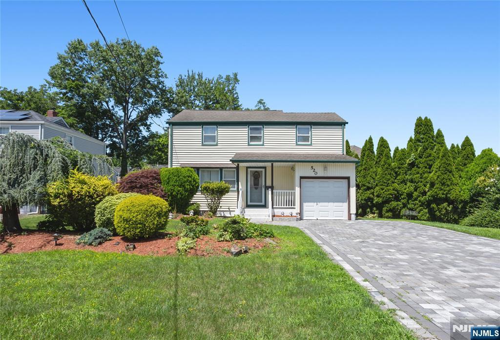 Welcome to 520 Washington Avenue in the beautiful town of Dumont! This well-appointed, centrally located home has a nice size living room, dining room, kitchen with stainless steel appliances, and a very spacious backyard. On the second floor you'll find 3 nice size bedrooms and a full bath. Finished basement with full bath completes this great property. Hardwood floors throughout, paved driveway and beautiful landscaping are some features that make this home a great buy! Close to transportation for easy commute to NYC, schools and shops. Come take a look and make it your own.