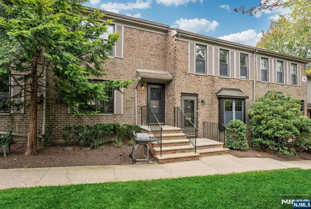 Rarely available unit with a Garage! Don't miss this updated 2 bedroom, 2.5 bath Townhome with open plan, located in the park-like setting of beautiful Inwood at Great Notch with lots of light and open space. The main level, with gleaming hardwood floors, has a Living Room with Gas burning fireplace and Dining Room with large pass through to Kitchen. The second floor, with newly refinished hardwood floors, includes the Primary Bedroom with a renovated, private bath and dual closets. The large second bedroom offers lots of light and a large closet. Access to the attic is via pull-down stairs. The Lower Level offers space for a Home Office and includes a Powder Room, the Laundry/Storage Room and entrance to the Garage. Home improvements include new staircase railing/banister (2017); hardwood floor sanded/stained, new recessed lighting and renovated both full baths (2021); New Refrigerator, Dishwasher (2023); Modern side-mounted garage door opener quiet, efficient and ceiling friendly (2025). Inwood at Great Notch offers an outdoor pool, a tennis court, basketball, pickleball, a playground and an adjacent park w/ a baseball diamond. Steps to NYC transportation, Montclair State University, Upper Montclair and Little Falls shopping and restaurants. Close to major NJ Highways 46, 3, 80 the GSP and the NJ Tpke.Chimneys, Flues, Fireplace being sold As-Is with no known issues. For resident-occupied unit, a minimum of 15% equity is required.