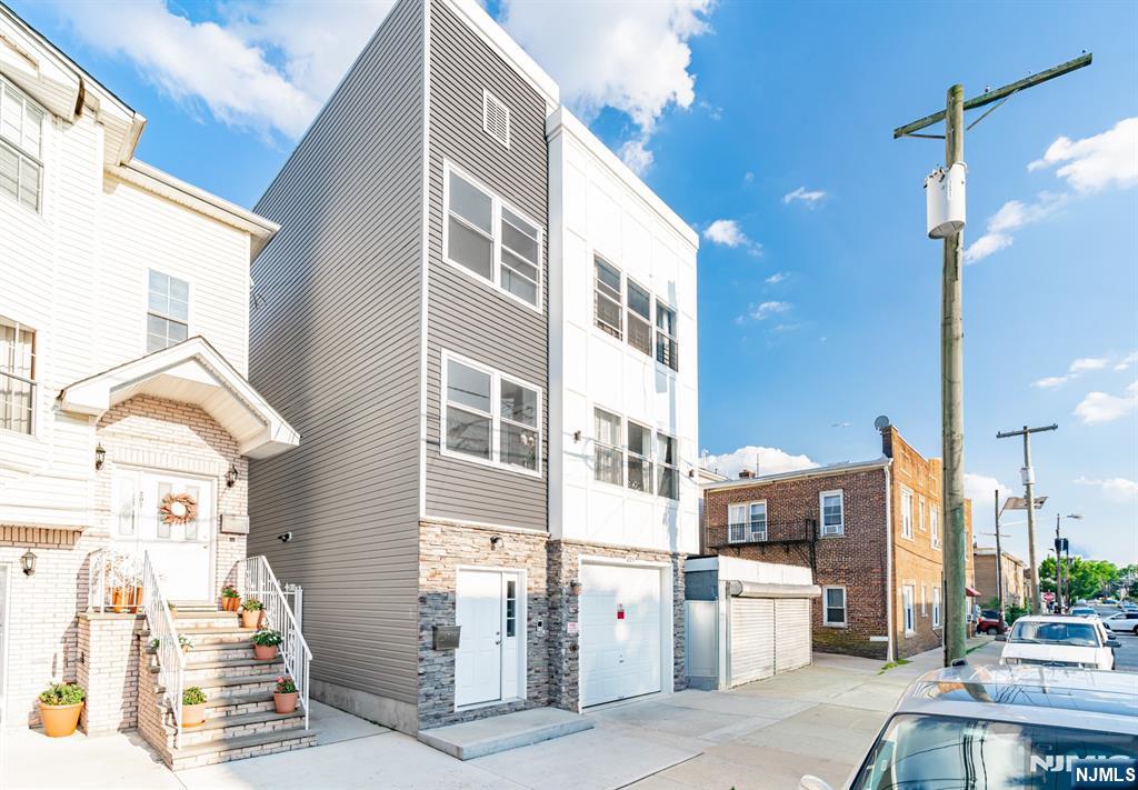 5 YEAR TAX ABATEMENT HAS JUST STARTED! NEWLY BUILT, UNIQUE two-family featuring a rare ground-level unit with 2 rooms and a full bath, home office, or added flexibility. The definition of turnkey, located in Newark Built by an experienced builder with no expense spared, showcasing quality craftsmanship, modern finishes, and thoughtful design throughout. ideal for Owner-occupants or investors seeking low maintenance, strong rental appeal, and long-term value in a high-demand location close to major transportation, shopping, and dining. come turn this house into a home before someone else does!