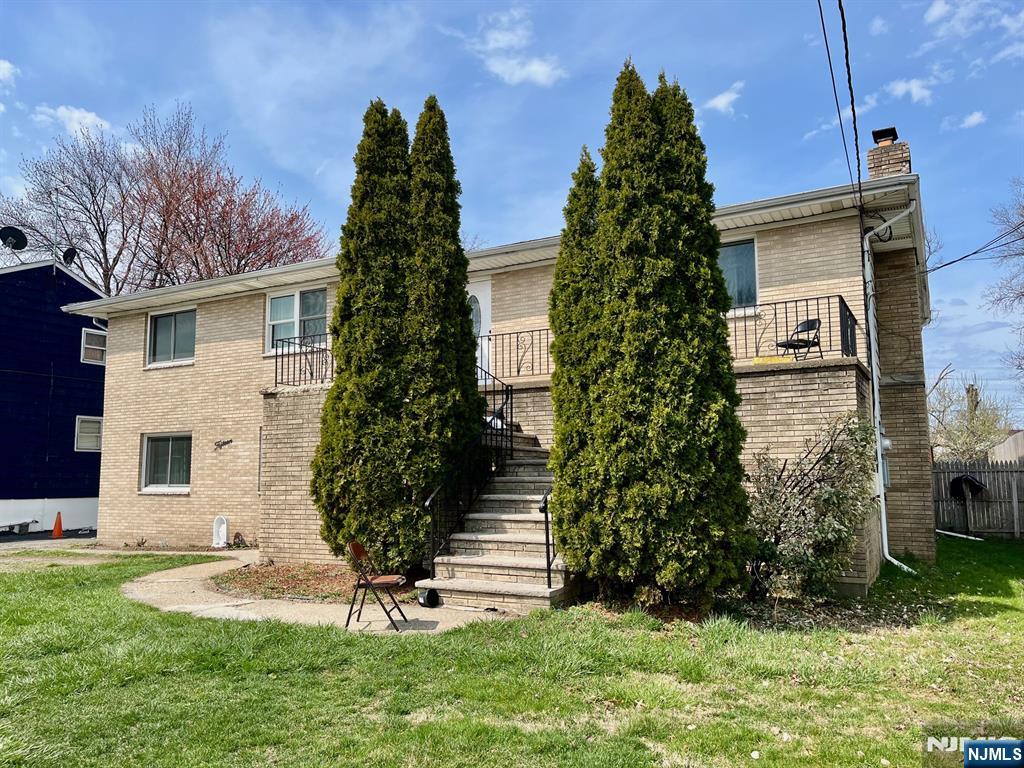 Located on a spacious 75X143, this home features high ceilings, hardwood floors, very spacious living rooms, dining rooms, and modern kitchens. 3 bedrooms and 2 full baths in each apartment! Two car garage, nice size backyard. Perfectly located, close to NYC transportation, schools, shopping and moreâ€¦