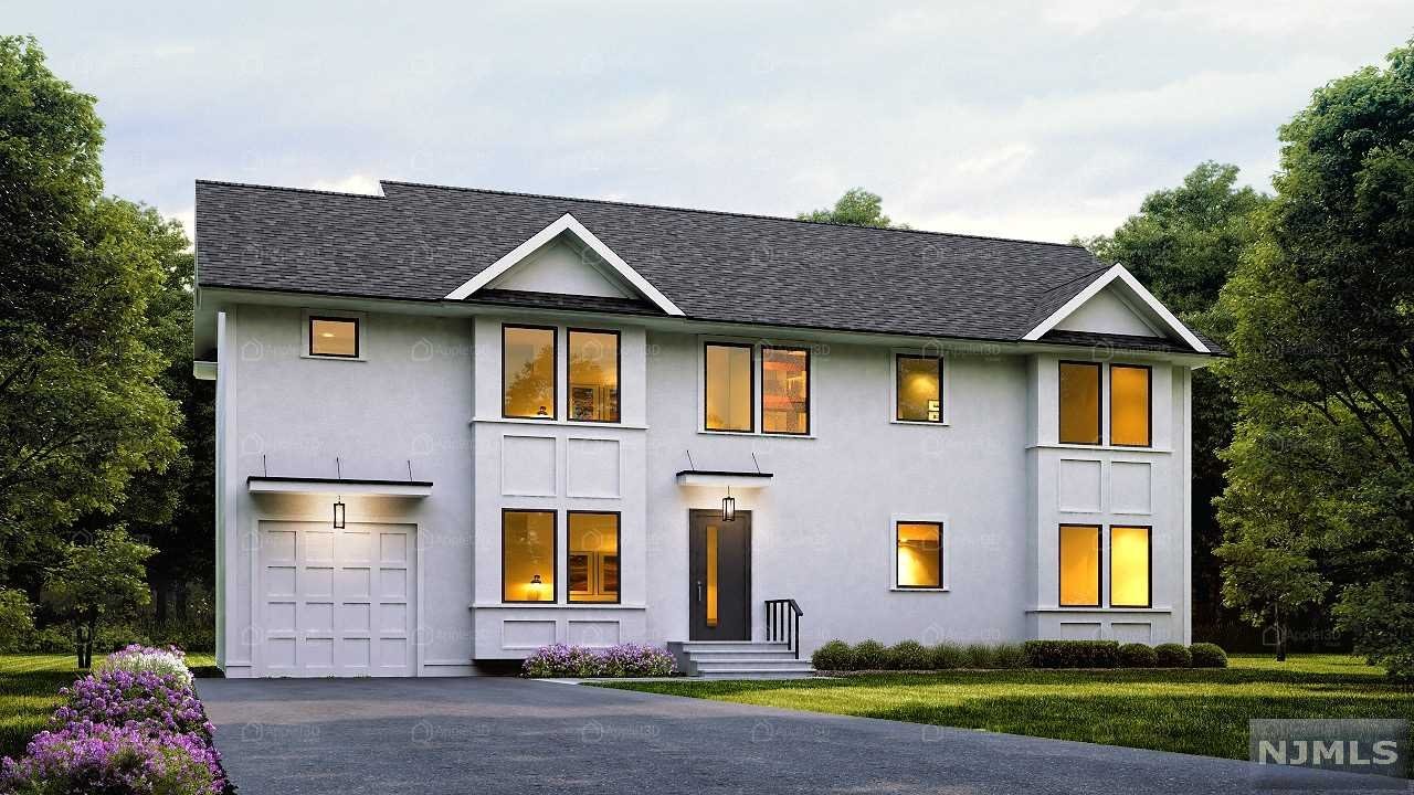 Gorgeous high-end new construction located in the desirable town of River Edge. This custom built colonial features five bedrooms, four full baths and over 3,000 sq feet of living space. The first floor features an inviting entry foyer, hardwood floors throughout, formal living room and dining room, gourmet kitchen with custom cabinets, quartz countertops and elegant center island, huge family room with gas fireplace, guest bedroom and a full bath. The second floor features a master bedroom with en suite bathroom and walk in closet, three additional bedrooms, two full baths and a laundry room. This home has a one car attached garage and a full basement with 8' ceilings. Close to highways, NYC transportation and a stone's throw away from the beautiful Van Saun County Park with plenty of activities for the family including a zoo with train and carousel, pony rides, several playgrounds, picnic and fishing areas.