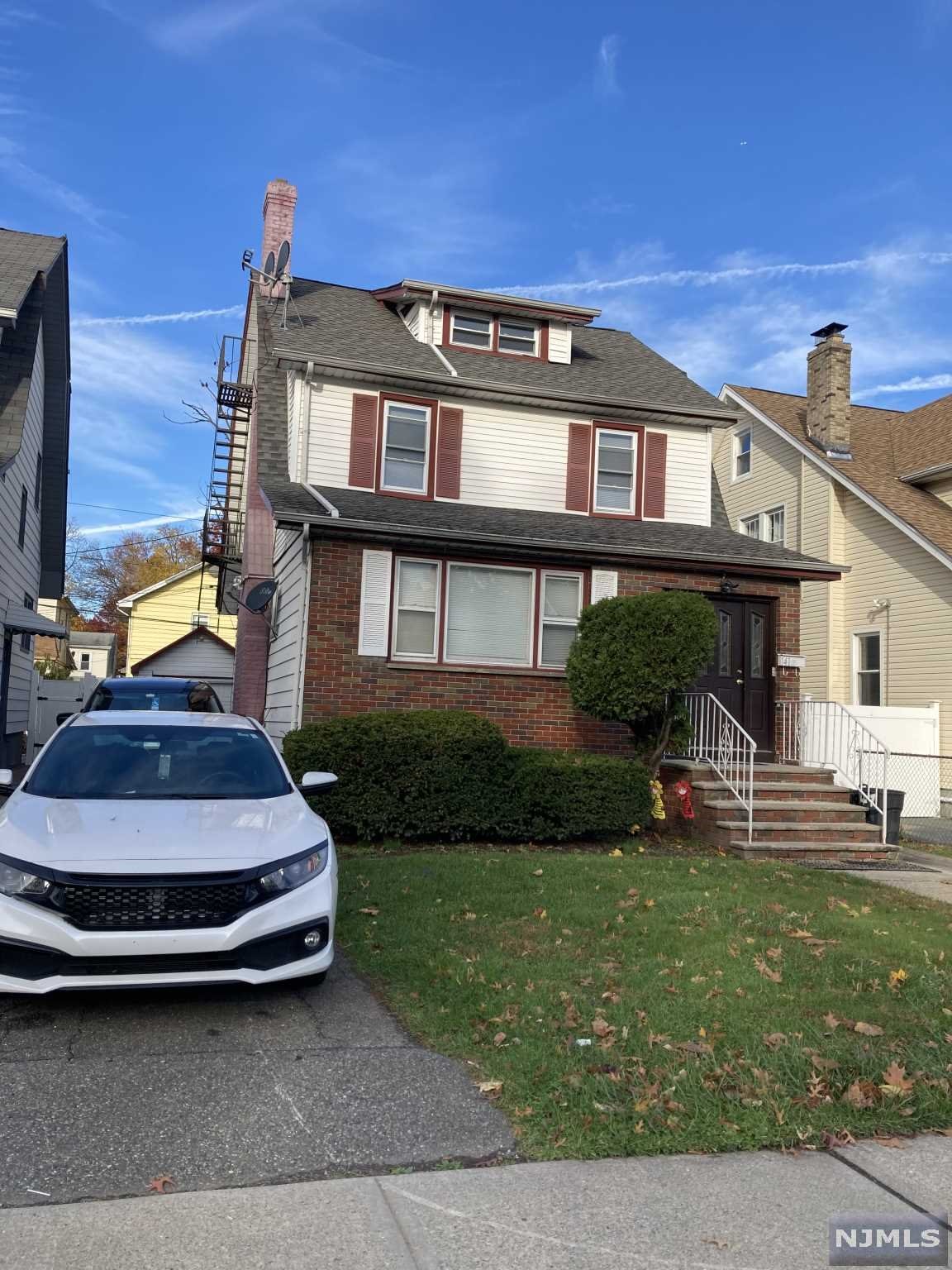 2 Family home 1st Floor-2 Bedroom,1 bath, Living Room Kitchen. 2nd Floor-1 Bedroom,1 Bath, Living Room, Kitchen and 3rd Floor with 1 bedroom connected to 2nd Floor. Finished basement with summer kitchen, 2 rooms and full bath. 1 Car garage. Separate heating