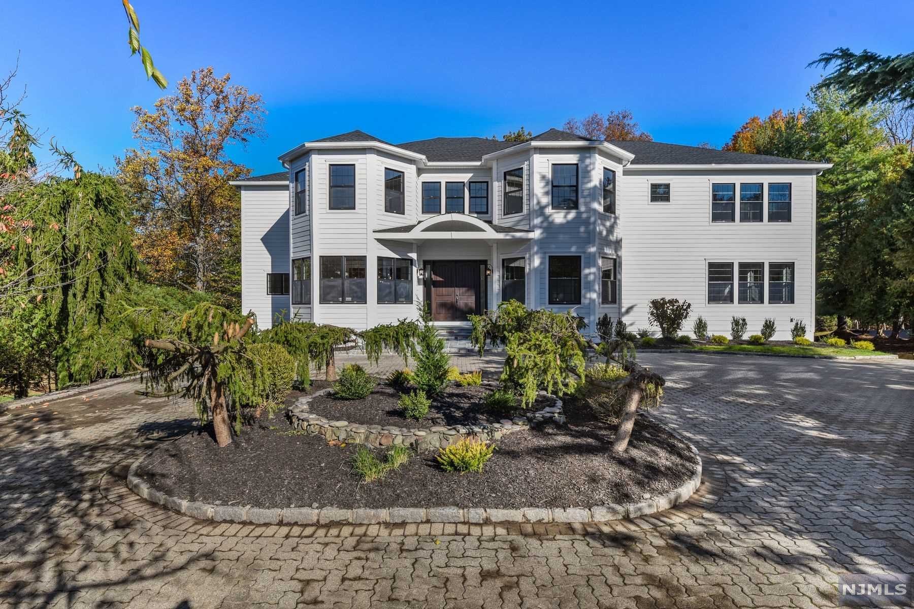 Stunning custom built 7BR/6.5BA colonial with 10300 sq ft of living space set on .63 acre lot in Laurel Hills section, Multi million dollar neighborhood ! This home boasts spacious open floor plan, 1st floor in-law suite and Study Room, Livingroom, family room and formal dining room, Game Room, Second Kitchen, The kitchen is complete w high-end SS appliances, center island ,quartz counters, custom cabinets. The 2nd floor is home to 5 impressive huge bedrooms, luxurious master suite , 2nd bedroom has its own en-suite, Loft, laundry. Fully finished walk-out basement with 10' ft ceilings, Mud room, Media room, Rec room, 7th bedroom and Full bath. Elevator.