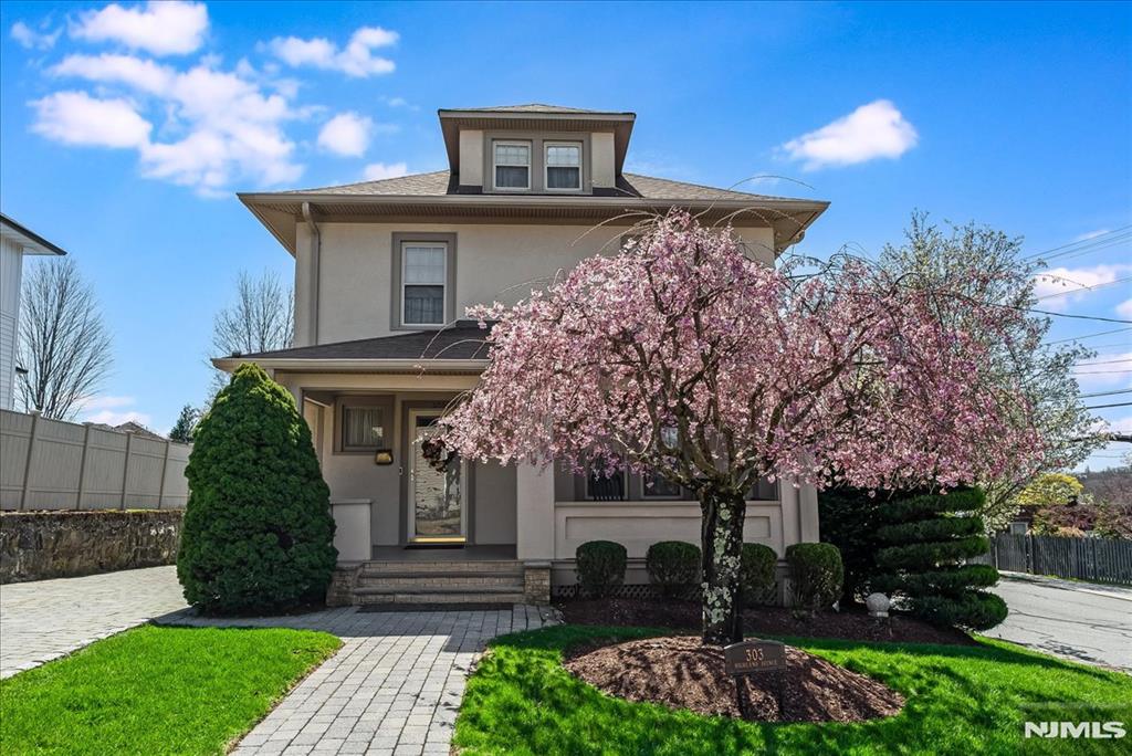Welcome to a meticulously maintained Custom Colonial in the Hill Section of Boonton. This home offers upscale living, designer-level finishes, and exceptional curb appeal in one of Boontonâ€™s most desirable neighborhoods. A charming front porch, professional landscaping with a fenced-in yard, paver driveway and walkways, and exterior uplighting create warm first impressions. Inside, this 4-bedroom + office, 2.5-bath home showcases beautiful natural light, and a flowing layout for both everyday living and entertaining. The spacious main level invites living and dining spaces with a beautifully appointed kitchen with Thermadore appliances and a Sub-Zero refrigerator/freezer, warming drawer, a Trex side deck, and a back room addition that can be used for recreation, or a first floor bedroom. Upstairs, 3 generously sized bedrooms, including a primary suite retreat, plus an office/potential 5th bedroom, provide comfort and versatility. Below, a walk-out basement offers additional potential for fitness, media space, crafts, or extended entertaining options with direct outdoor access. The pristine condition reflects true pride of ownership. Conveniently located near downtown Boonton shops, restaurants, parks, major highways, and NJ Transit access, this exceptional property blends timeless style with modern convenience. Come experience all that 303 Highland Ave has to offer.