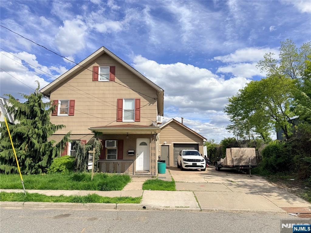 Large colonial in a dead-end street offering on the 1st floor, living room, kitchen, Diningroom or Family room, sliding door to back yard, 2nd floor offering Master bedroom, Master Bath with Jacuzzi and stand up shower, Bedroom, Bedroom, Full Bathroom. walk up attic 1st floor with all ceramic tile floor, oversized garage can fit 4 cars, it has a gas industrial blower, also it has a separate electric panel and 220 volt. , separate a/c unit and a full bathroom. Great for a contractor, a new custom attached, French drainage around the entire perimeter of the house, brand new concrete slab on the main floor, all new support 47" deep with rebar buried in 6000 iso, tow lundry hook up's, newer 75 gal water heater, all new basboard heater, it's located minutes from public transportation and major highways.
