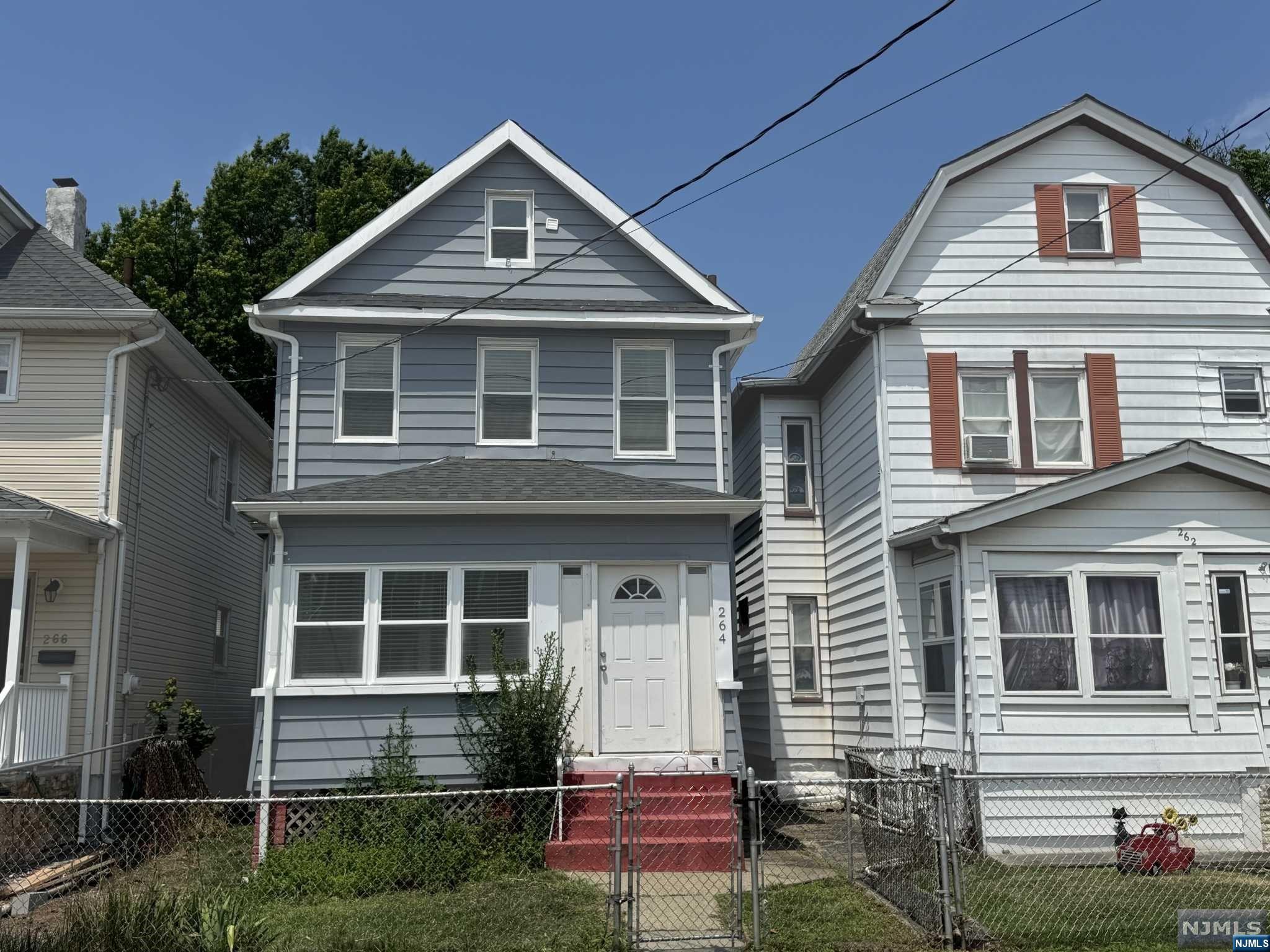 Welcome to this charming three-bedroom, one-bathroom home in the heart of Passaic, New Jersey. This inviting residence features an open floor plan on the first floor, adorned with beautiful Laminate floors that create a warm and welcoming ambiance. The spacious living area seamlessly flows into the dining and kitchen areas, perfect for both everyday living and entertaining guests. Step outside to discover a large backyard, offering ample space for outdoor activities, gardening, or simply relaxing in your private oasis. This home is conveniently located close to the downtown business district, providing easy access to a variety of shops, restaurants, and services. Major highways are just minutes away, making commuting a breeze. Enjoy the convenience of nearby ,school,houses of worship and parks ideal for outdoor recreation,also close to shopping centers are within easy reach, ensuring you have everything you need right at your fingertips.