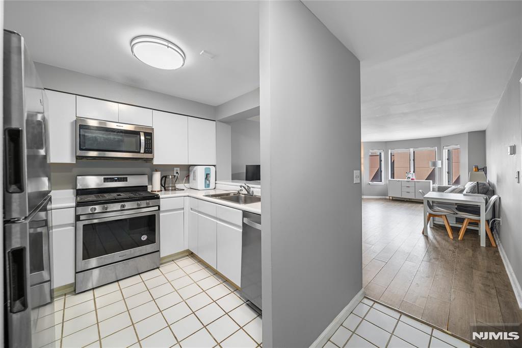 ***CALL/TEXT WAYNE BONSELL @ 607-239-0541*** Welcome to 503 Hancock Court, a beautifully maintained 1-bedroom, 1-bath residence nestled within Edgewater's sought-after Independence Harbor community. This bright and inviting home offers an ideal blend of comfort, convenience, and resort-style living along the Hudson River waterfront. The thoughtfully designed layout features a spacious living and dining area, a generously sized bedroom, ample closet space, and large windows that fill the home with natural light. The kitchen offers plenty of cabinetry and workspace, while the private outdoor area provides the perfect spot to enjoy your morning coffee or unwind after a long day. Residents of Independence Harbor enjoy an impressive collection of amenities including outdoor pools, tennis courts, a fitness center, beautifully landscaped grounds, and waterfront promenades. Commuters will appreciate easy access to NYC via ferry, bus, and major highways, while nearby shopping, dining, parks, and entertainment make everyday living effortless. Whether you're a first-time buyer, downsizer, or investor, this exceptional home presents a rare opportunity to own in one of Edgewater's most desirable waterfront communities.