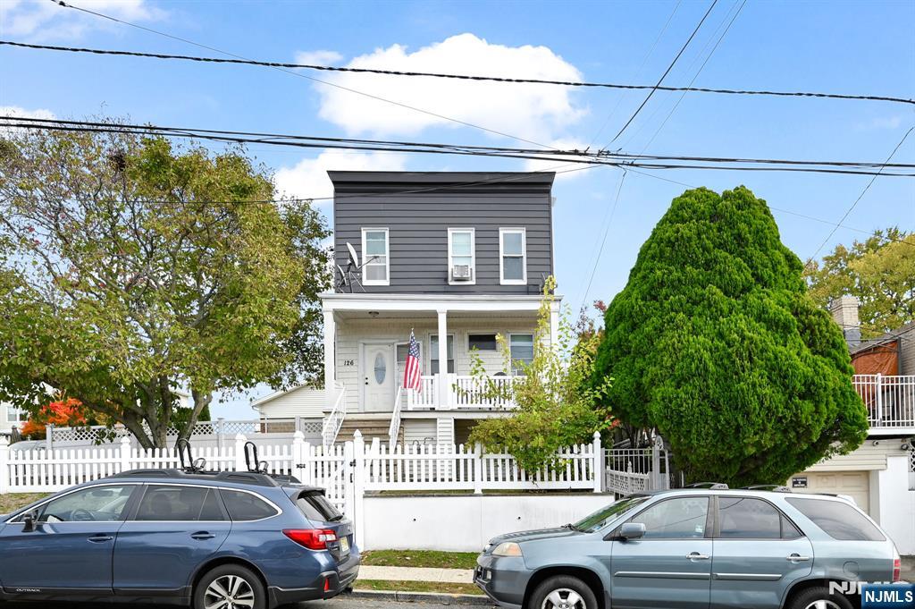 **PRIME 2-FAMILY INVESTMENT OPPORTUNITY IN GARFIELD, NJ!** Great for investors or first-time buyers seeking rental income! Discover this versatile 2-family home, ideal as a lucrative investment property or a smart entry for first-time buyers who want built-in rental assistance to offset mortgage costs. Generate multiple income streams with ease! Key features: spacious layout with 4 bedrooms and 3 full bathrooms [on each floor] â€“ perfect for large groups or high-yield tenants. Income potential with current rents below market value, offering instant upside. Single-car garage is currently rented separately [$650/month]. Separate utilities for hassle-free management. Outdoor upgrade includes brand-new patio for relaxation or tenant appeal. Prime location with walking distance to public transportation, parks, schools, shopping, and places of worship â€“ everything you and/or your tenants need! **LOW TAXES** - Keep more of your profits with affordable property taxes. This property screams multiple revenue streams â€“ live in one unit, rent the other [and the garage!], or lease both for maximum ROI. Don't miss out on this turnkey gem in a convenient Garfield neighborhood! Be sure to preview the 3-D virtual tour and Seller's Property Condition Disclosure for more info! Present all offers with pre-approval and/or proof of funds. SCHEDULE YOUR PRIVATE APPOINTMENT NOW!