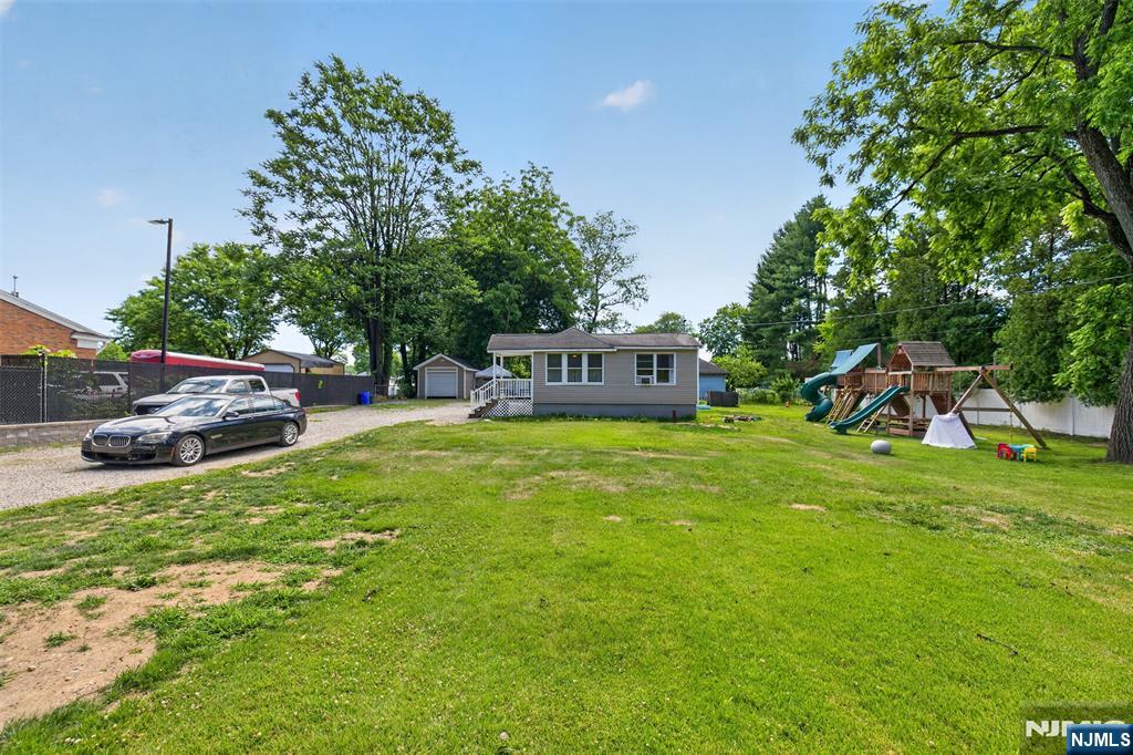 Welcome to this beautiful 2 bedroom, 1 bath ranch situated on an oversized .50 acre lot offering plenty of space and endless possibilities. The open concept kitchen flows seamlessly into the living room, creating a bright and welcoming living space. Recent updates include a brand new roof and boiler, providing peace of mind for years to come. The property also features a detached garage and a spacious backyard with ample room for recreation, gardening, or future expansion. This is a wonderful opportunity to own a well maintained home with a generous lot size. Please note that the property is located in a flood zone and flood insurance will be required. Seller has flood insurance quote for annual premium of $420.25 ($35.00 per month). Property is currently subjected to a foreclosure proceeding.