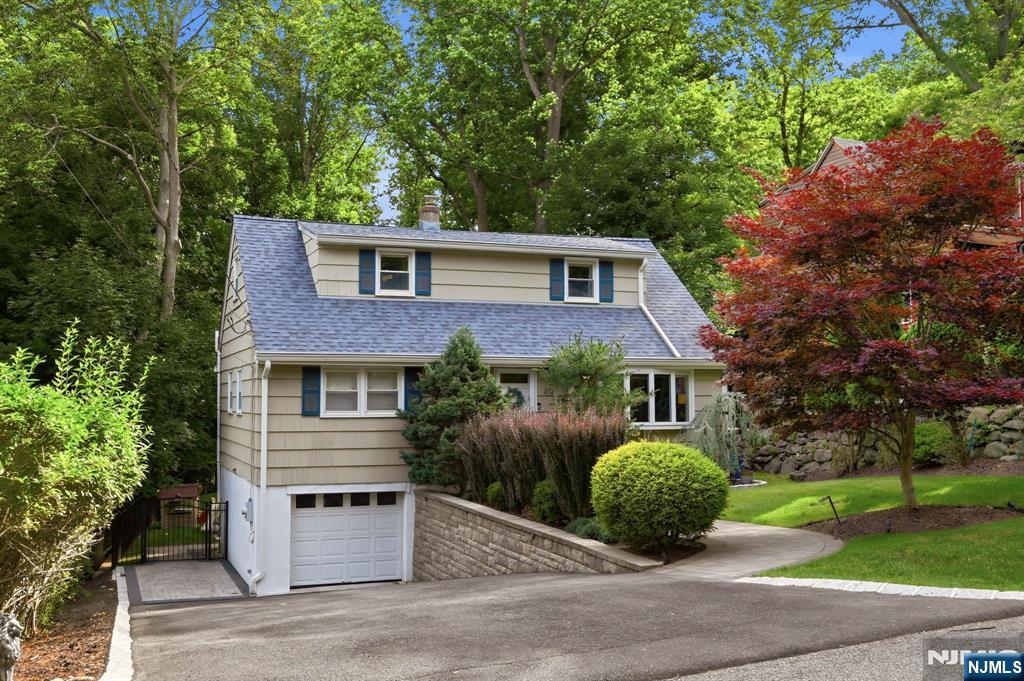 Nestled in Oakland's highly sought-after Manito section, this is the "peace of mind" home you've been waiting for. You know that never-ending to-do list that usually comes with buying a house? You can throw it away. Between 2023 and 2024, practically everything major was taken care of: a brand-new roof, gutters, shutters, an expanded driveway, gorgeous hardscaping (retaining walls, walkways, and a paver patio), a fully fenced yard, shed, and a refreshed deck with brand-new columns. Oh, and the big-ticket mechanics? The furnace, AC, and whole-house humidifier are all nearly new, too. Inside, this move-in-ready home features 4 bedrooms, 2 updated full baths with tiled showers over tubs, and gleaming hardwood floors throughout. The updated kitchen, featuring a slider that opens directly to a beautiful wood deck, is ideal for your morning coffee or hosting weekend barbecues. Downstairs, the fully finished walkout basement offers incredible bonus space, perfect for a gym or play area, as well as a laundry room and mudroom. Walk right out onto your paver patio and take in the expansive, lush backyard. With a brand-new fence, it's a private oasis perfect for relaxing and entertaining. Sq ft as per tax records.