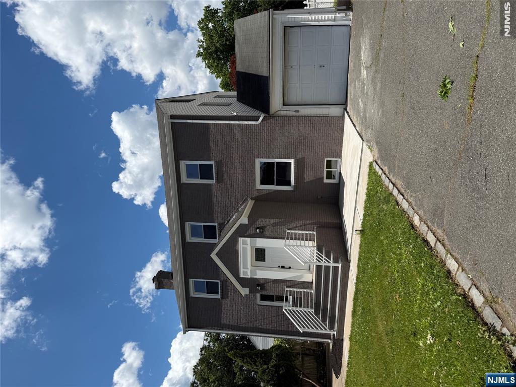 Location, Location, Location!Welcome to this beautifully renovated Colonial-style house located in a highly desirable residential neighborhood. Filled with character and charm, this move-in-ready property offers the perfect blend of classic elegance and modern updates. Featuring 7 spacious rooms, 4 bedrooms, and 3 full bathrooms, this house provides plenty of space for comfortable living. The large living room is ideal for entertaining, while the finished basement with a full bath offers additional living space perfect for a recreation room, office, or guest area. Enjoy beautiful hardwood floors throughout and a modern kitchen equipped with stainless steel appliances, all included in the sale. Central air conditioning provides year-round comfort, and the new backyard deck creates the perfect setting for outdoor dining, relaxation, and gatherings. Situated on a generous 55 x 119 lot, the property also features a one-car garage and parking for up to four vehicles. Conveniently located near major highways, parks, shopping, schools, and public transportation, this exceptional house offers both comfort and convenience. Don't miss this wonderful opportunity to own a beautifully updated Colonial in a prime location. Schedule your private showing today!