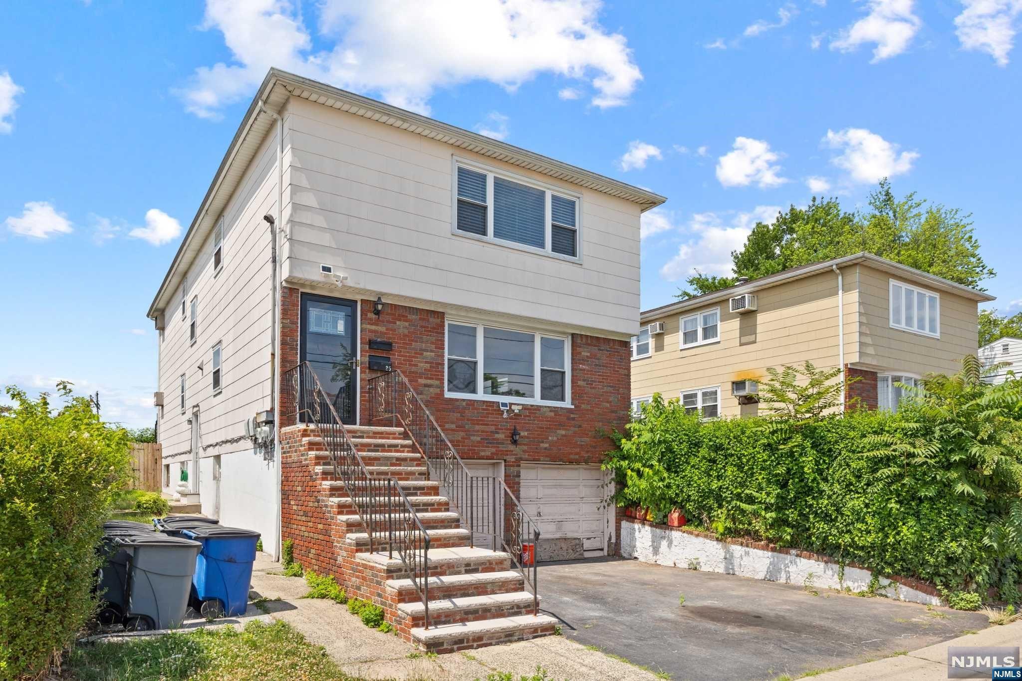 Great investment opportunity. 2 family home. First floor unit has 3 bedrooms, living room, dining room, kitchen and full bath. 2nd floor unit has 3 bedrooms, living room, dining room, kitchen and full bath. Full finished basement with bedroom, kitchen, living room and full bath.Fenced in yard with patio. Built-in 2 car garage and driveway for 4 cars.