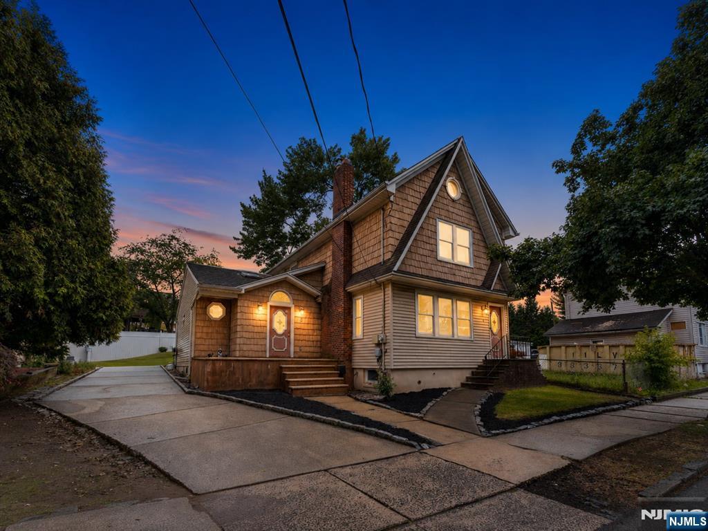 Located in one of Kearny's most desirable neighborhoods, this charming 3-bedroom, 1.5-bath home offers the perfect blend of space, comfort, and functionality. It features a versatile layout with two separate living areas, including a sun-filled family room with beautiful skylights that flood the space with natural light. The home also offers a formal living room, a formal dining room, and a cozy fireplace, creating the perfect setting for both everyday living and entertaining. Central air provides year-round comfort throughout all four levels of the home. The finished basement offers additional living space ideal, while the walk-up attic provides abundant storage and future potential. Situated on a generous lot, the property also offers access to a private road from the rear of the home, providing added convenience and an extra sense of privacy. Conveniently located near schools, shopping, parks, and major transportation, this home is an excellent choice for commuters. Don't miss the opportunity to make this wonderful home your own!
