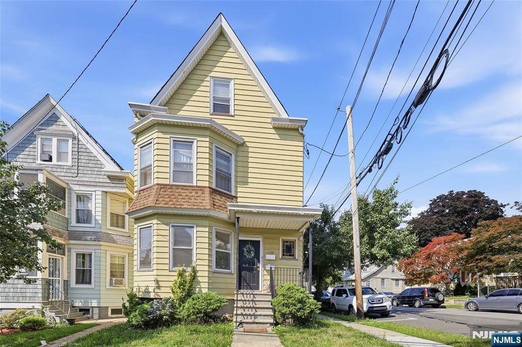 Incredible opportunity to own or invest in a prime piece of Passaic County real estate with this beautifully maintained two-story multi-family home situated on a desirable corner lot in Prospect Park. Each residence features a bright and airy floor plan with two generously sized bedrooms, one pristine full bathroom, a spacious and welcoming living room, and a massive eat-in kitchen that's perfect for everyday living and entertaining. Modern conveniences include central air conditioning, natural gas forced-air heating, and dedicated in-unit laundry hookups. The property also offers a full unfinished basement, providing ample storage space and future potential, as well as a detached two-car garage for convenient parking and additional storage. Ideally located for commuters and students alike, this home is just minutes from William Paterson University, Passaic County Community College, and major highways. Enjoy convenient access to supermarkets, shopping centers, hospitals, a variety of restaurants, and houses of worship. Outdoor enthusiasts will appreciate being just steps from local parks, including Hofstra Park, as well as a short drive to the historic Paterson Great Falls. Whether you're looking for an exceptional investment opportunity or a place to call home, this Prospect Park gem offers the perfect combination of comfort, convenience, and outstanding value.