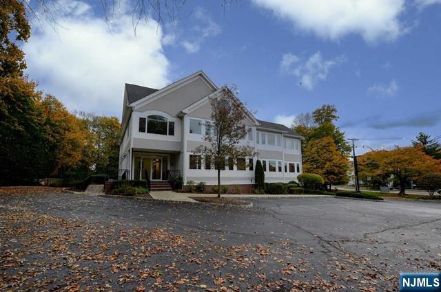 Light, bright professional office suite offers 636 sf on the 2nd floor of a highly visible elevator building. Zoned for general office or medical use, this suite is ideal for any professional. Suite has two rooms with separate entrances and can be shared or one can be used as a reception/waiting room. Utilities are included. Ample parking.